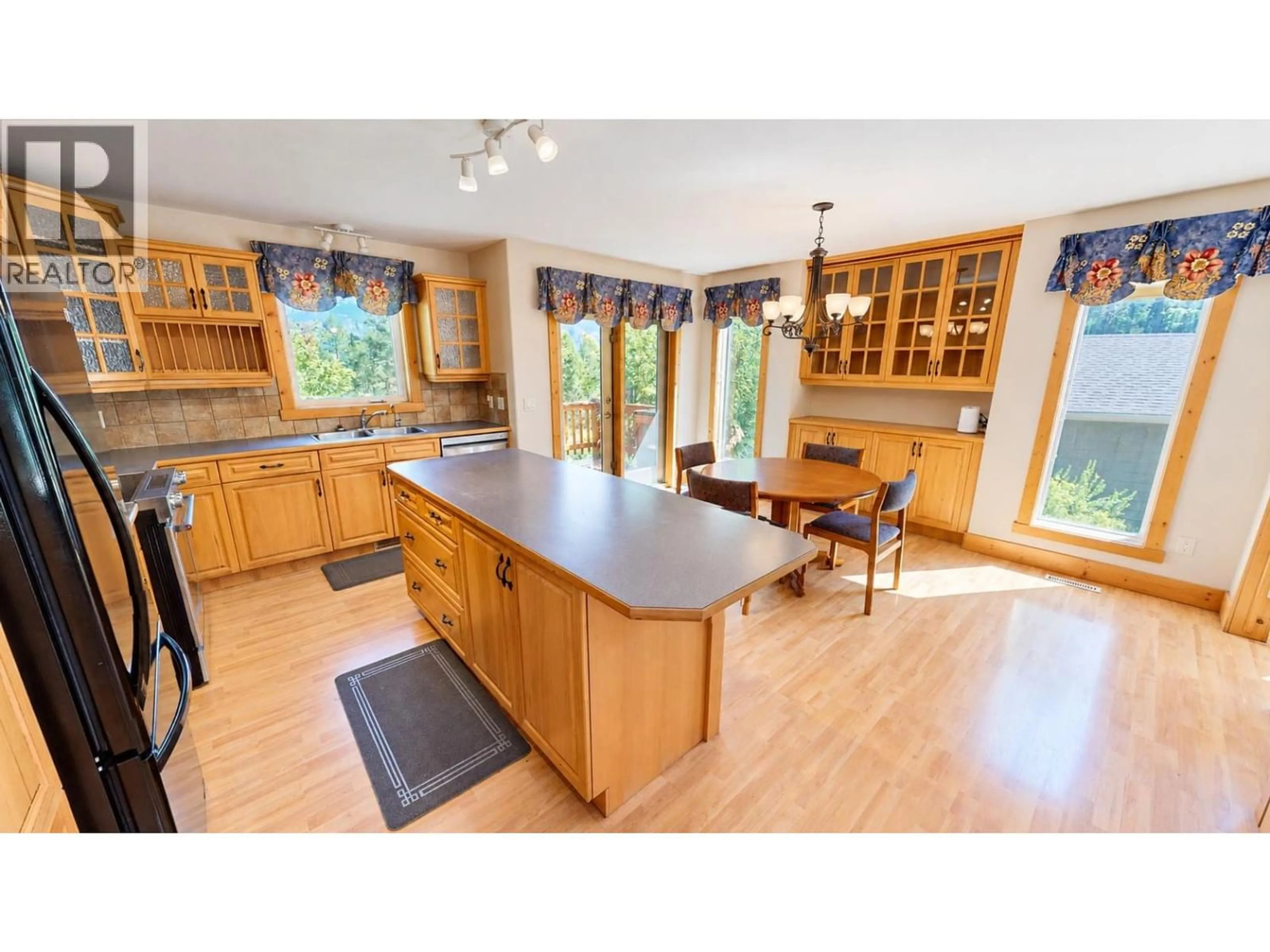 Open concept kitchen, wood/laminate floor for 3 - 1630 JOHNSTON ROAD, Invermere British Columbia V0A1K0