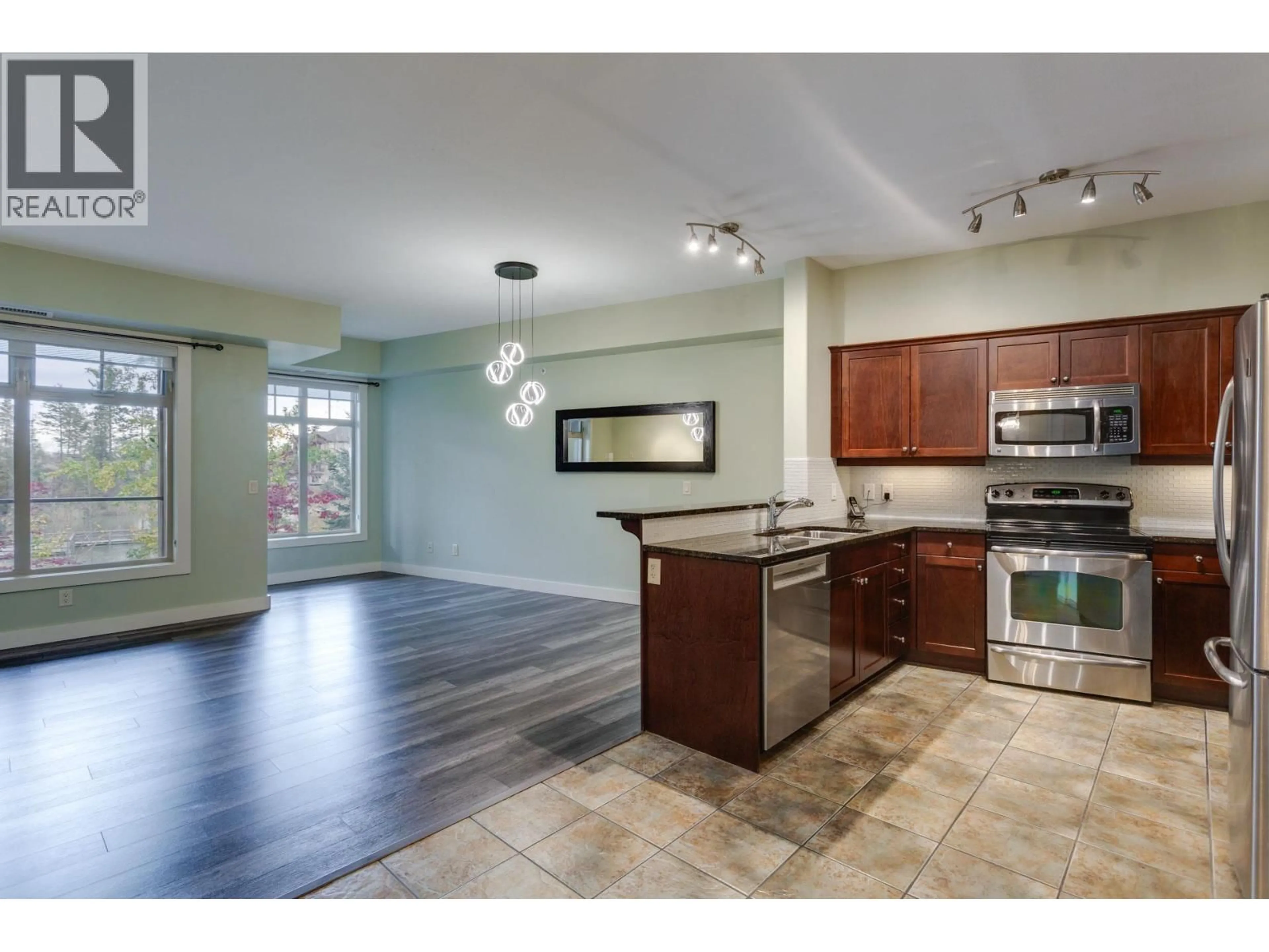 Open concept kitchen, ceramic/tile floor for 219 - 2611 STILLWATER WAY, Lake Country British Columbia V4V2R3