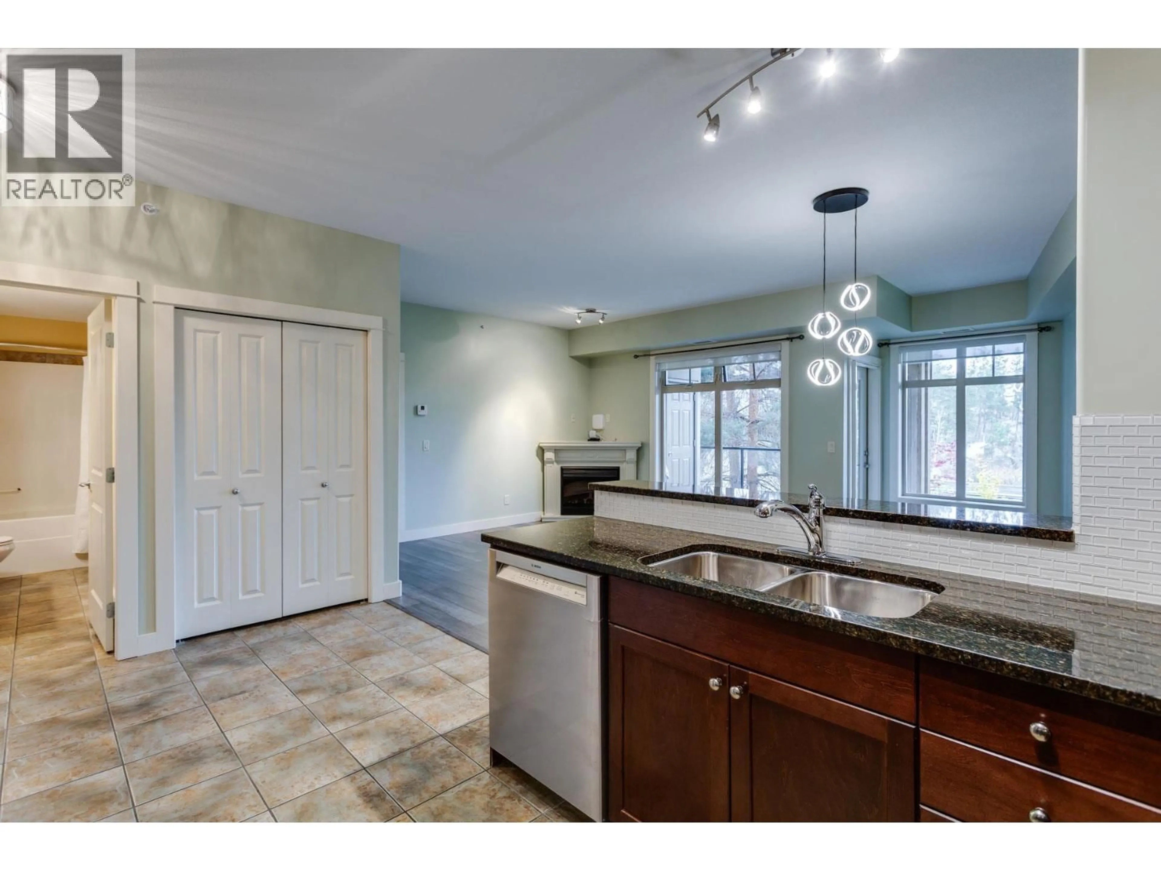 Open concept kitchen, ceramic/tile floor for 219 - 2611 STILLWATER WAY, Lake Country British Columbia V4V2R3