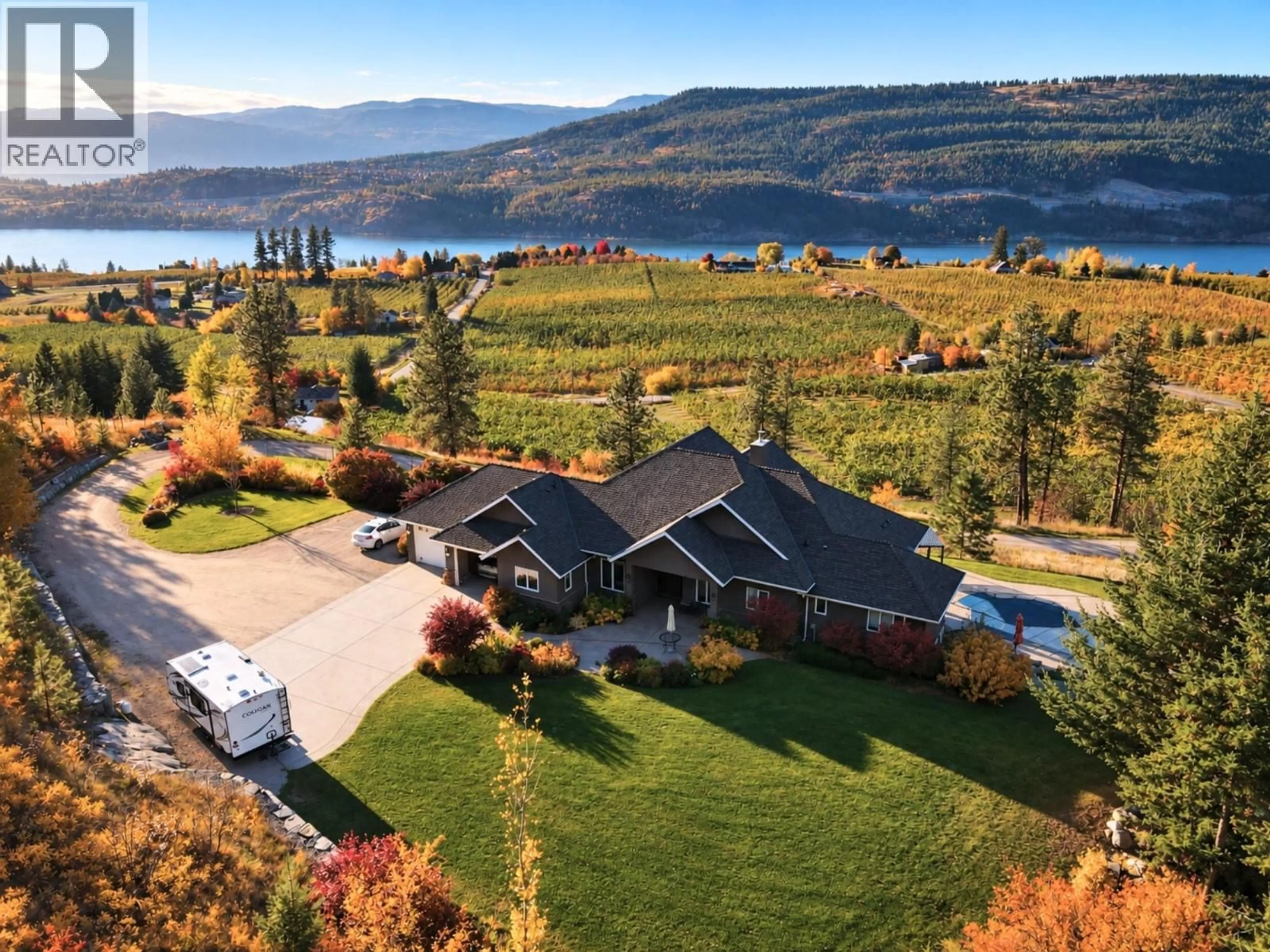 A pic from outside/outdoor area/front of a property/back of a property/a pic from drone, water/lake/river/ocean view for 13615 MIDDLE BENCH ROAD, Lake Country British Columbia V4v2B4