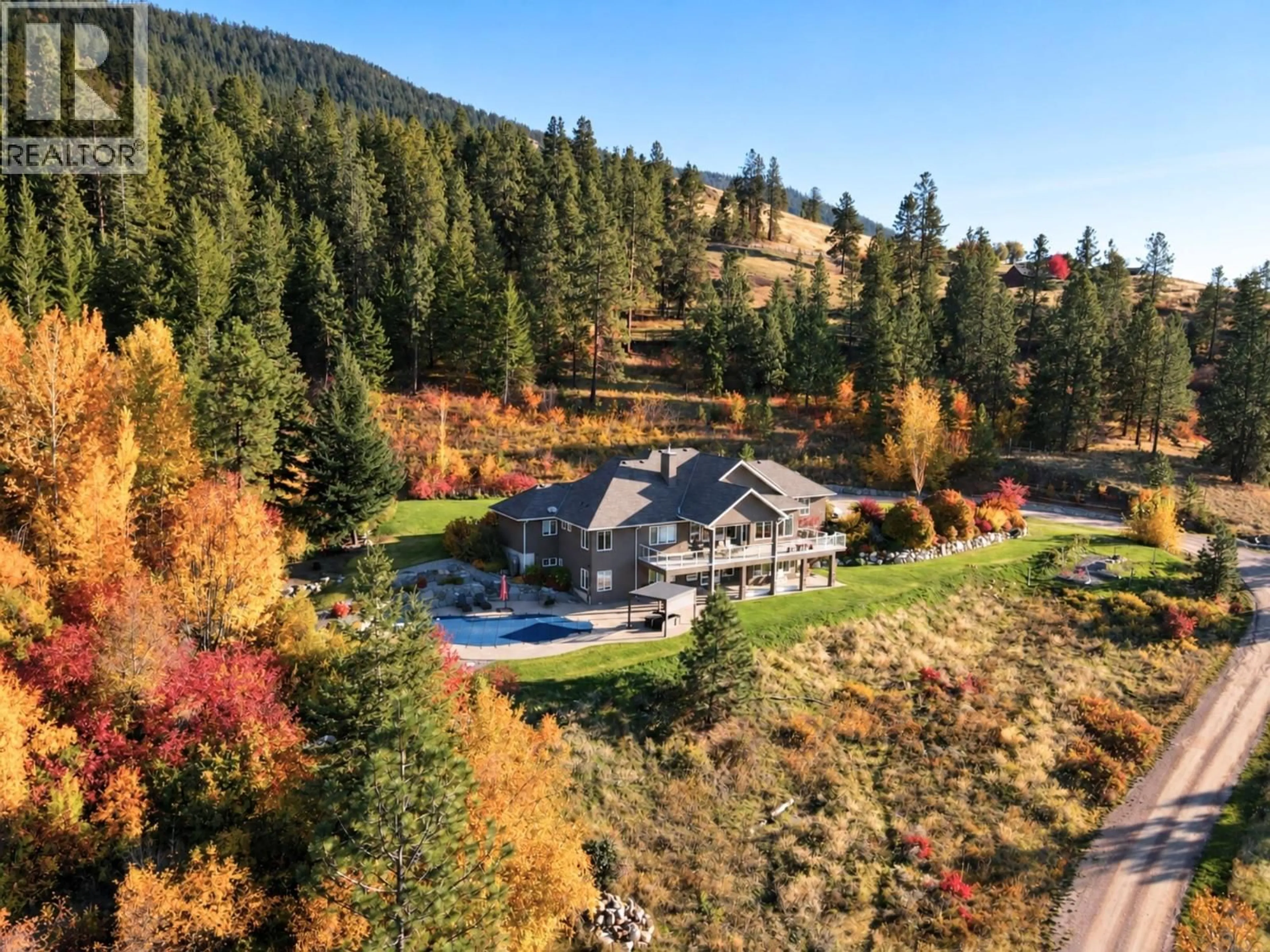 A pic from outside/outdoor area/front of a property/back of a property/a pic from drone, mountain view for 13615 MIDDLE BENCH ROAD, Lake Country British Columbia V4v2B4