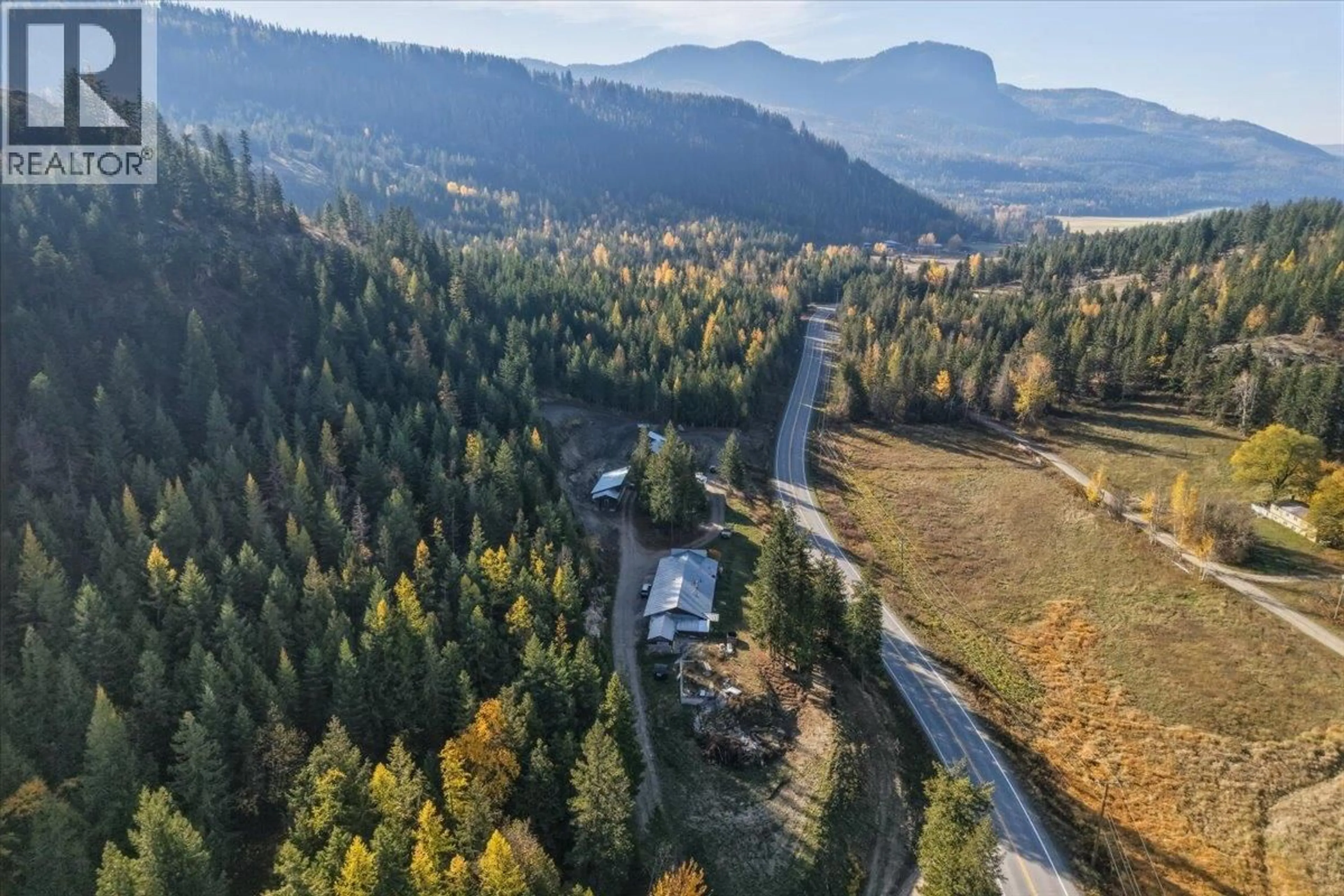 A pic from outside/outdoor area/front of a property/back of a property/a pic from drone, forest/trees view for 1880 HIGHWAY 6 OTHER, Lumby British Columbia V0E2G1