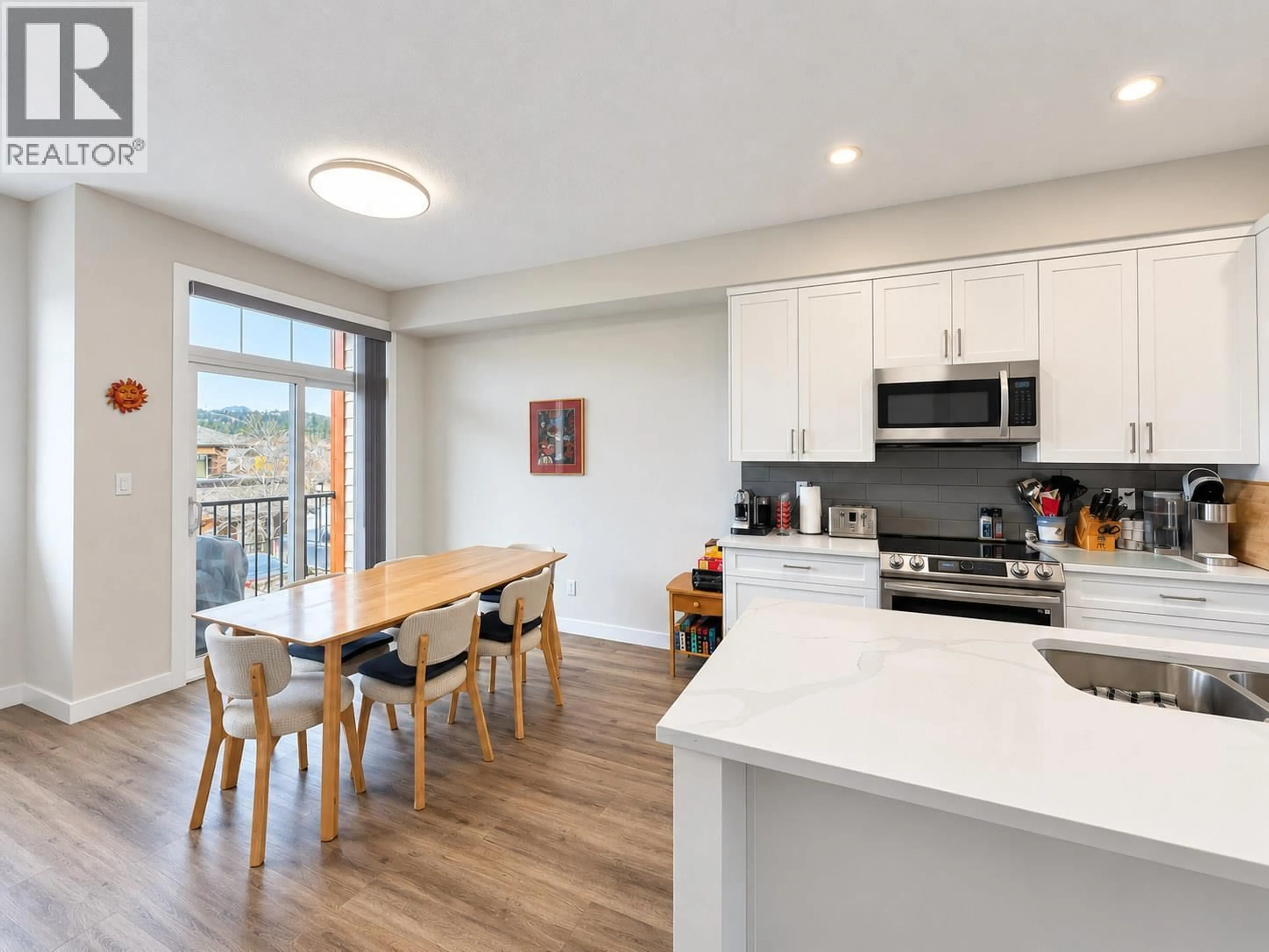 Open concept kitchen, wood/laminate floor for 2 - 810 6TH AVENUE, Invermere British Columbia V0A1K0