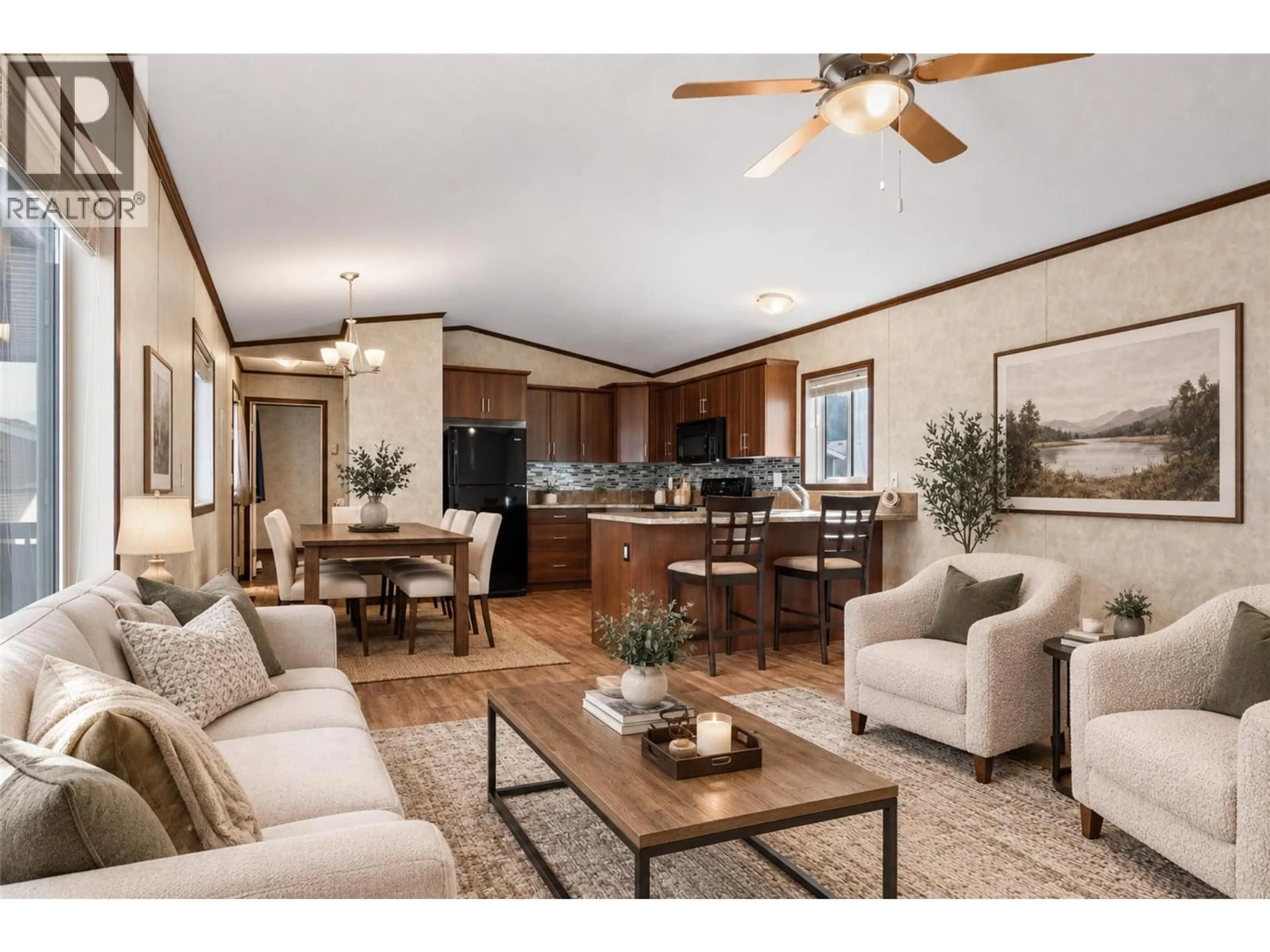 Living room with furniture, wood/laminate floor for 27 - 7805 DALLAS DRIVE, Kamloops British Columbia V2C0E5