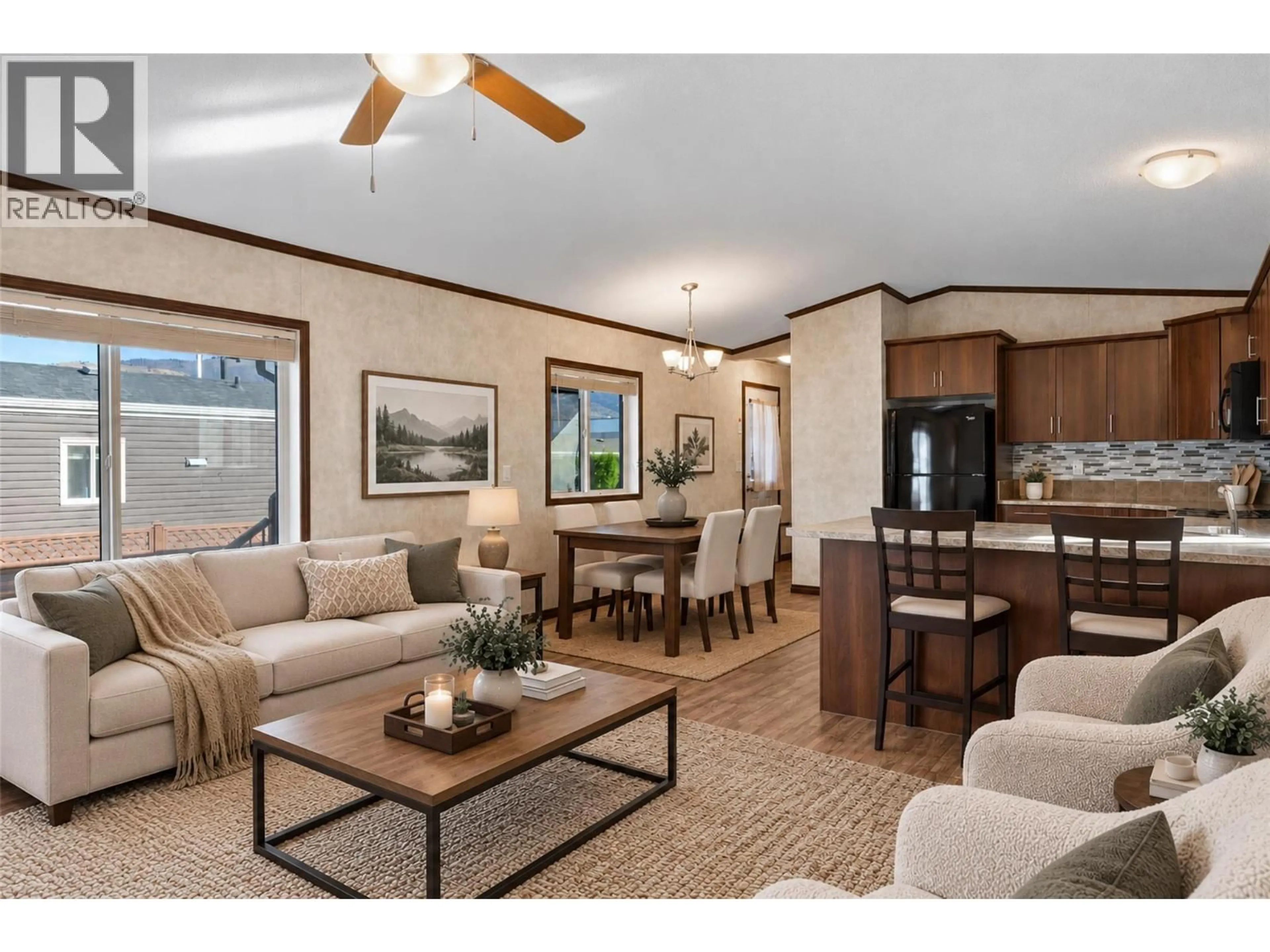 Living room with furniture, wood/laminate floor for 27 - 7805 DALLAS DRIVE, Kamloops British Columbia V2C0E5