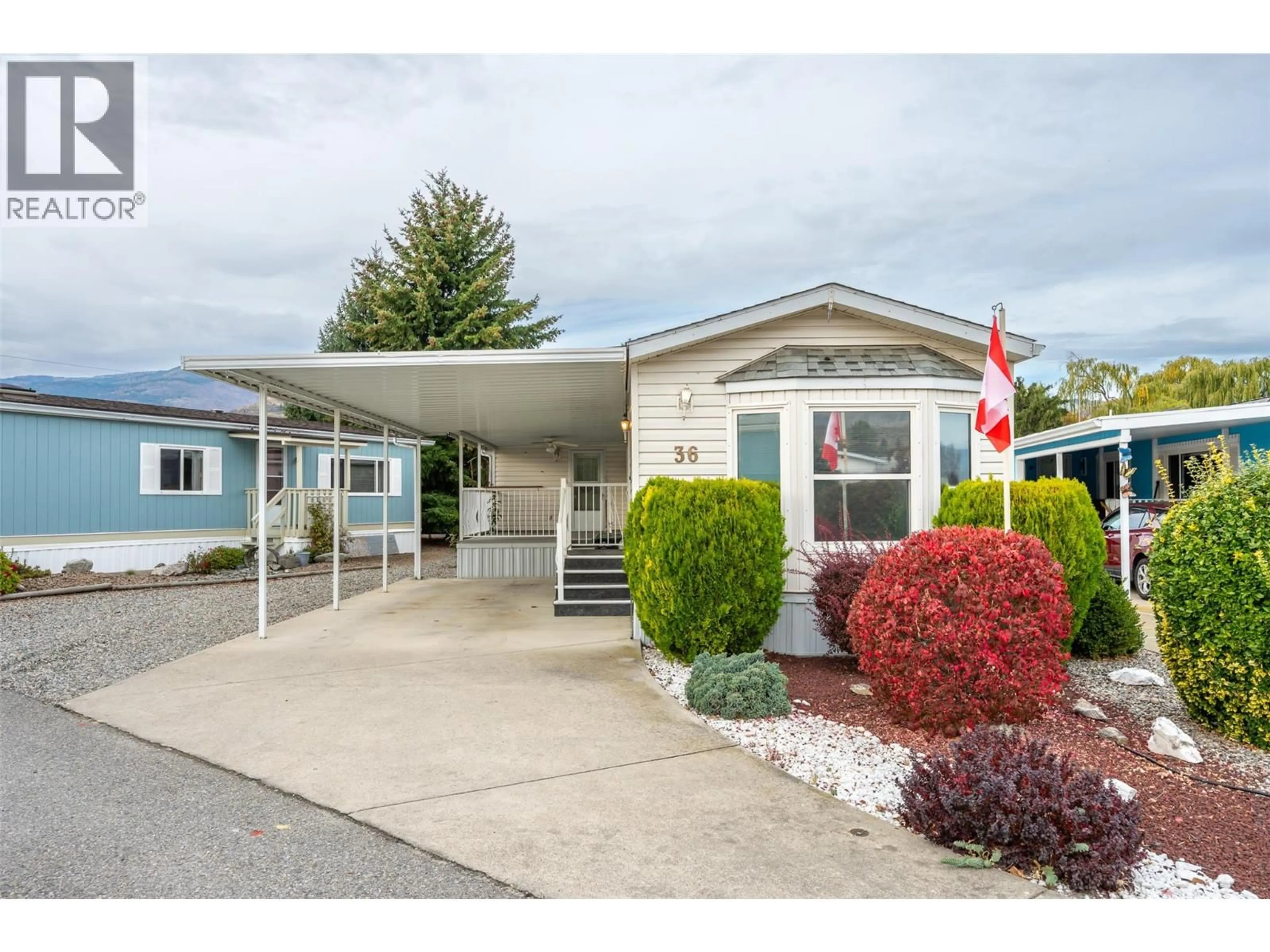 Home with vinyl exterior material, street for 36 - 6778 TUCELNUIT DRIVE, Oliver British Columbia V0H1T0