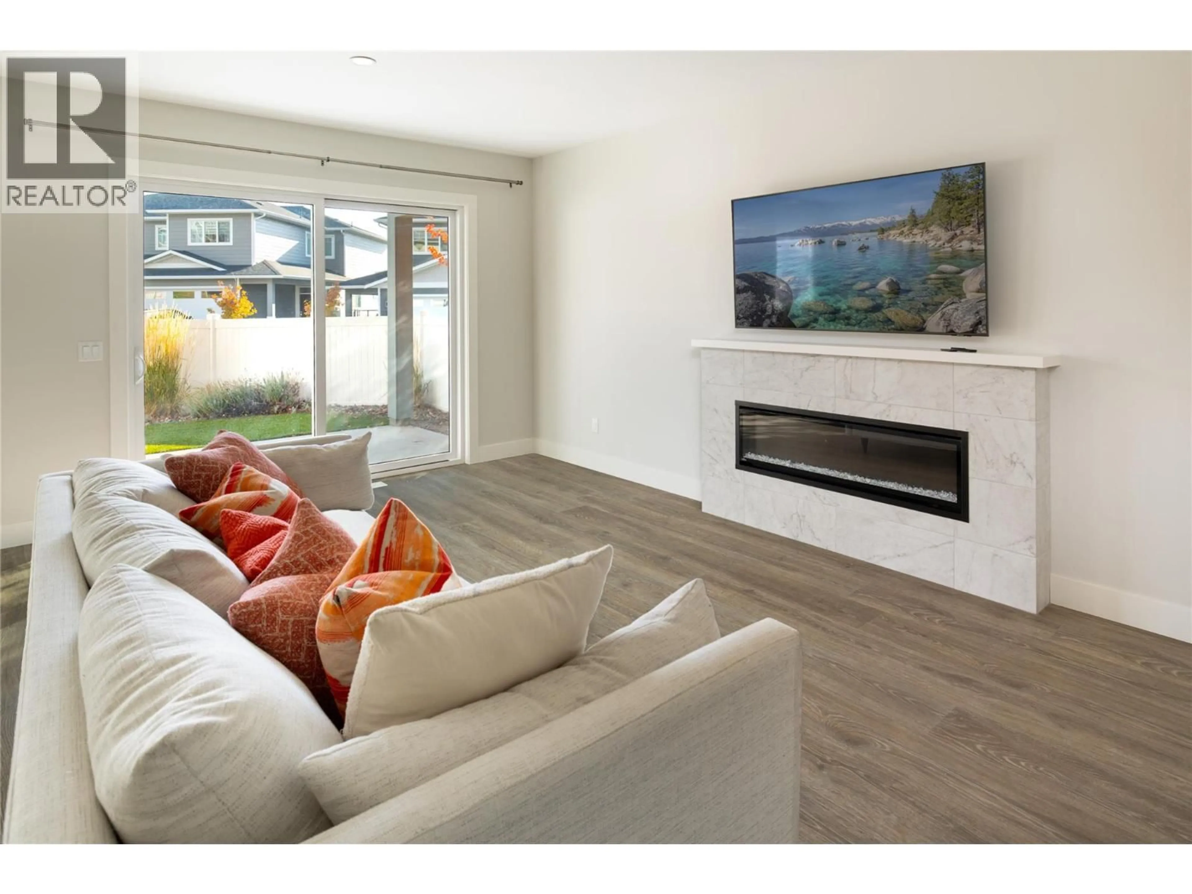 Living room with furniture, wood/laminate floor for 3370 HAWKS CRESCENT, Westbank British Columbia V4T0A7
