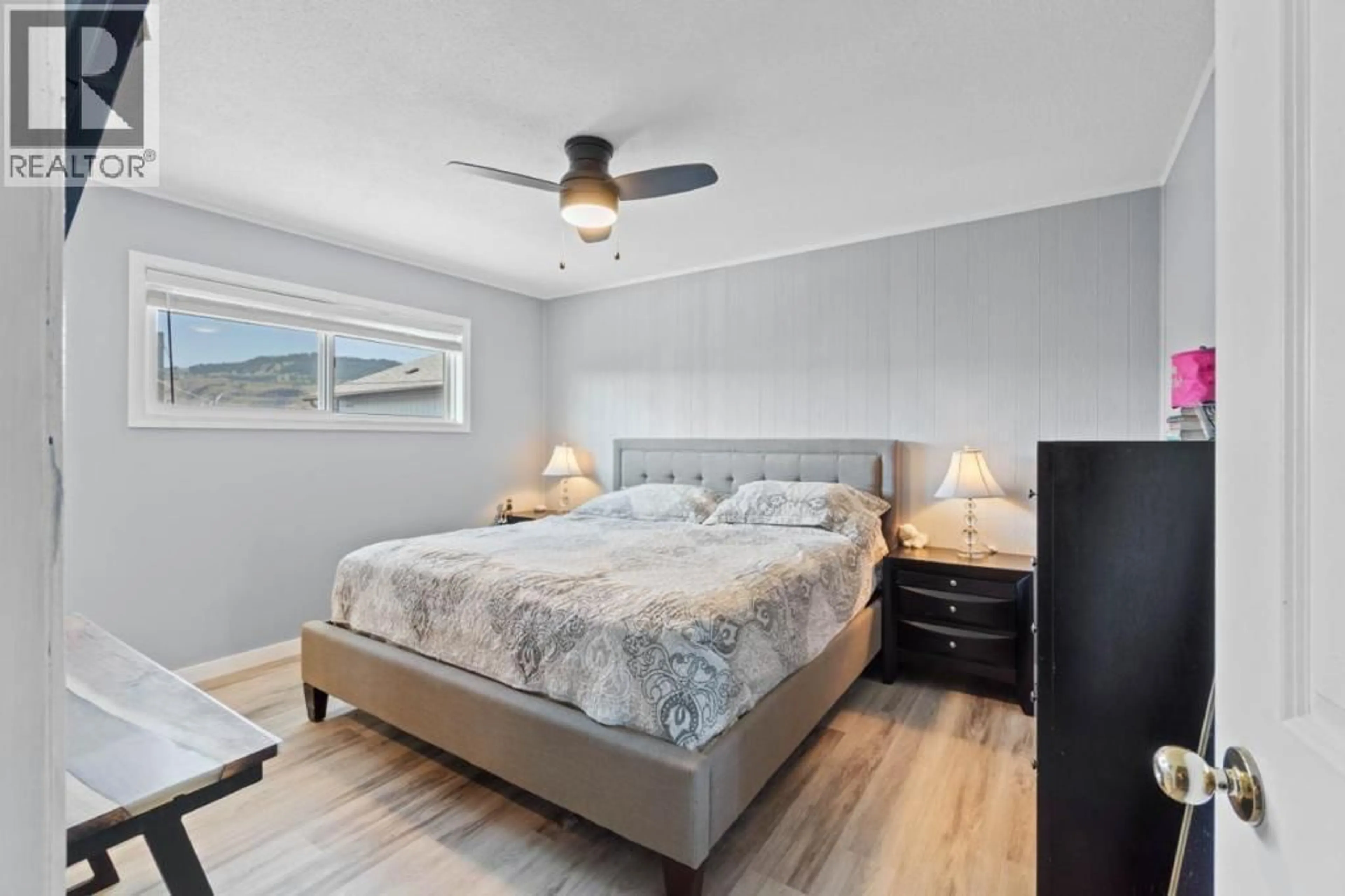 Bedroom with bed, wood/laminate floor for 1151 SELKIRK AVENUE NORTH, Kamloops British Columbia V2B1V5