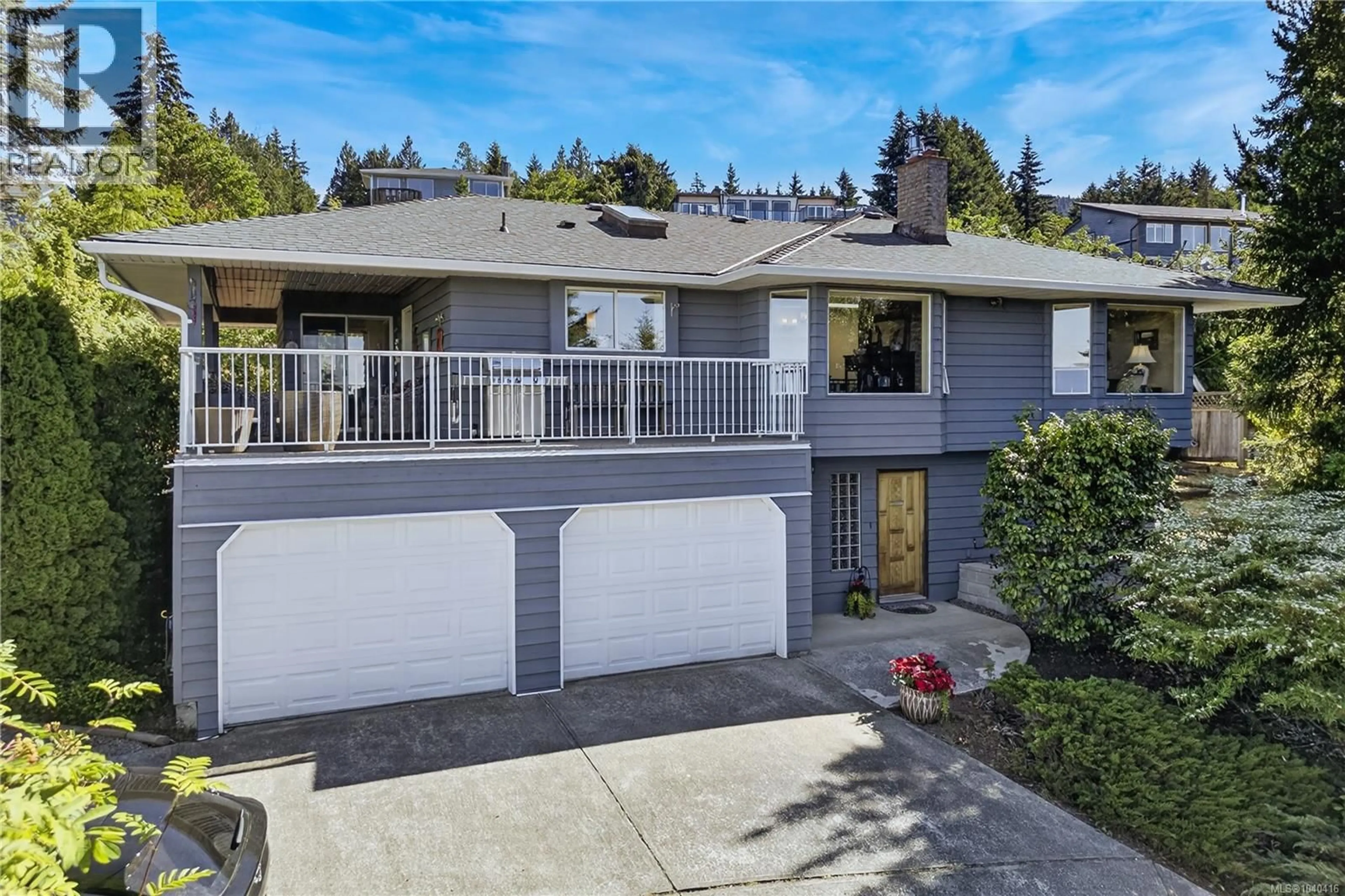 Home with vinyl exterior material, street for 8109 NORTHWIND DRIVE, Lantzville British Columbia V0R2H0