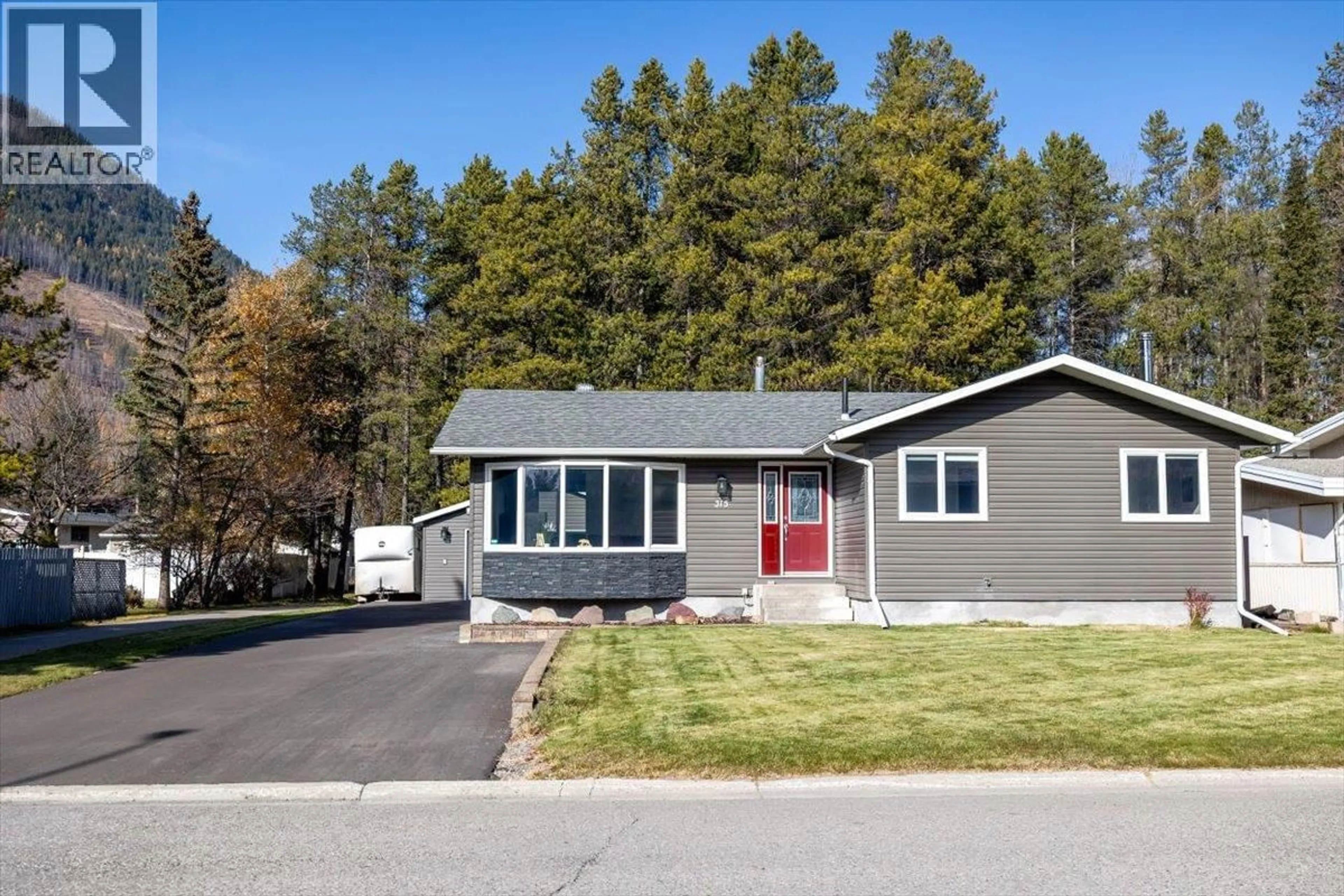 Home with vinyl exterior material, street for 315 WESTERN LARCH CRESCENT, Sparwood British Columbia V0B2G0