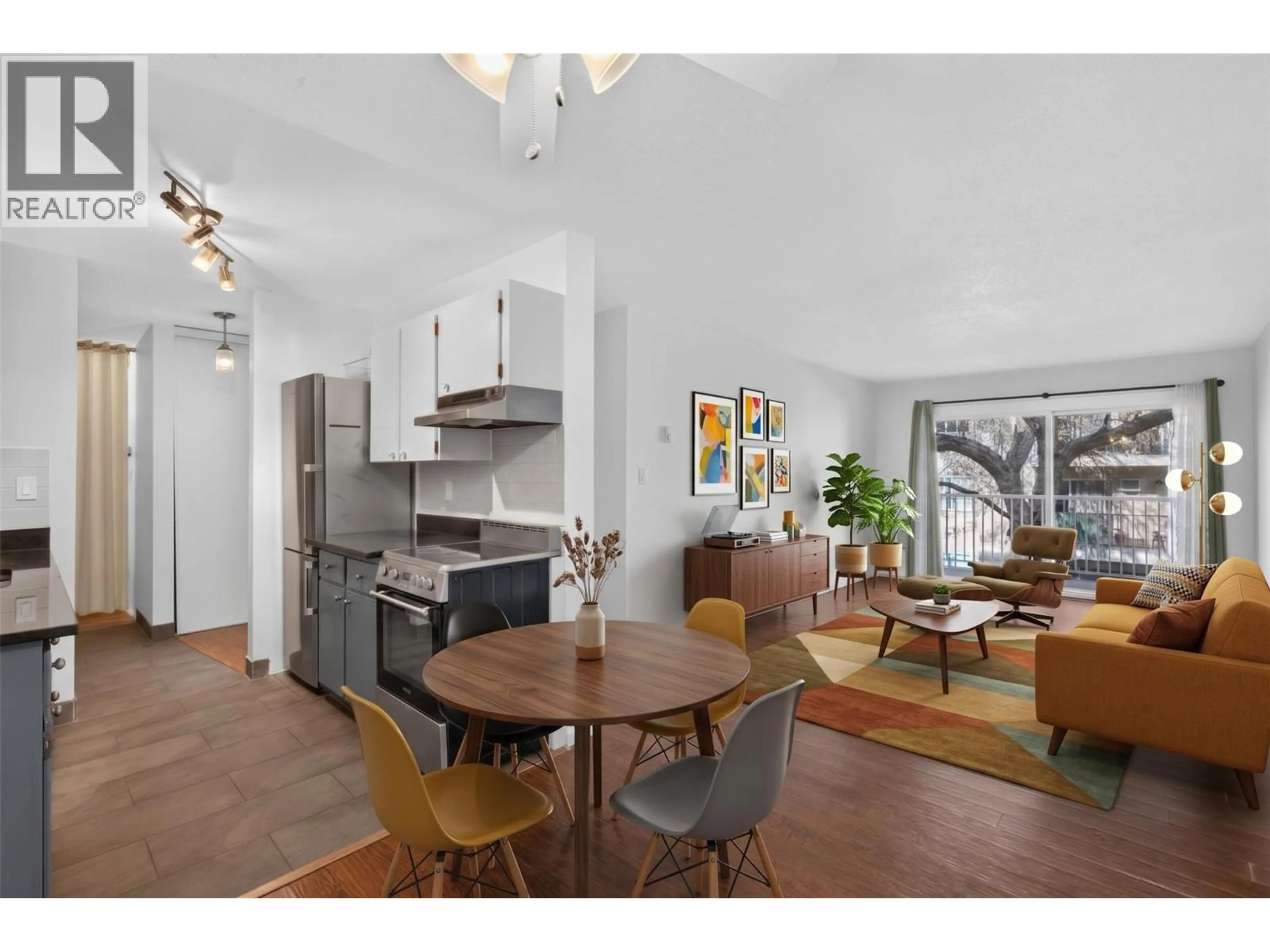 Open concept kitchen, wood/laminate floor for 214 - 395 FRANKLYN ROAD, Kelowna British Columbia V1X5X8