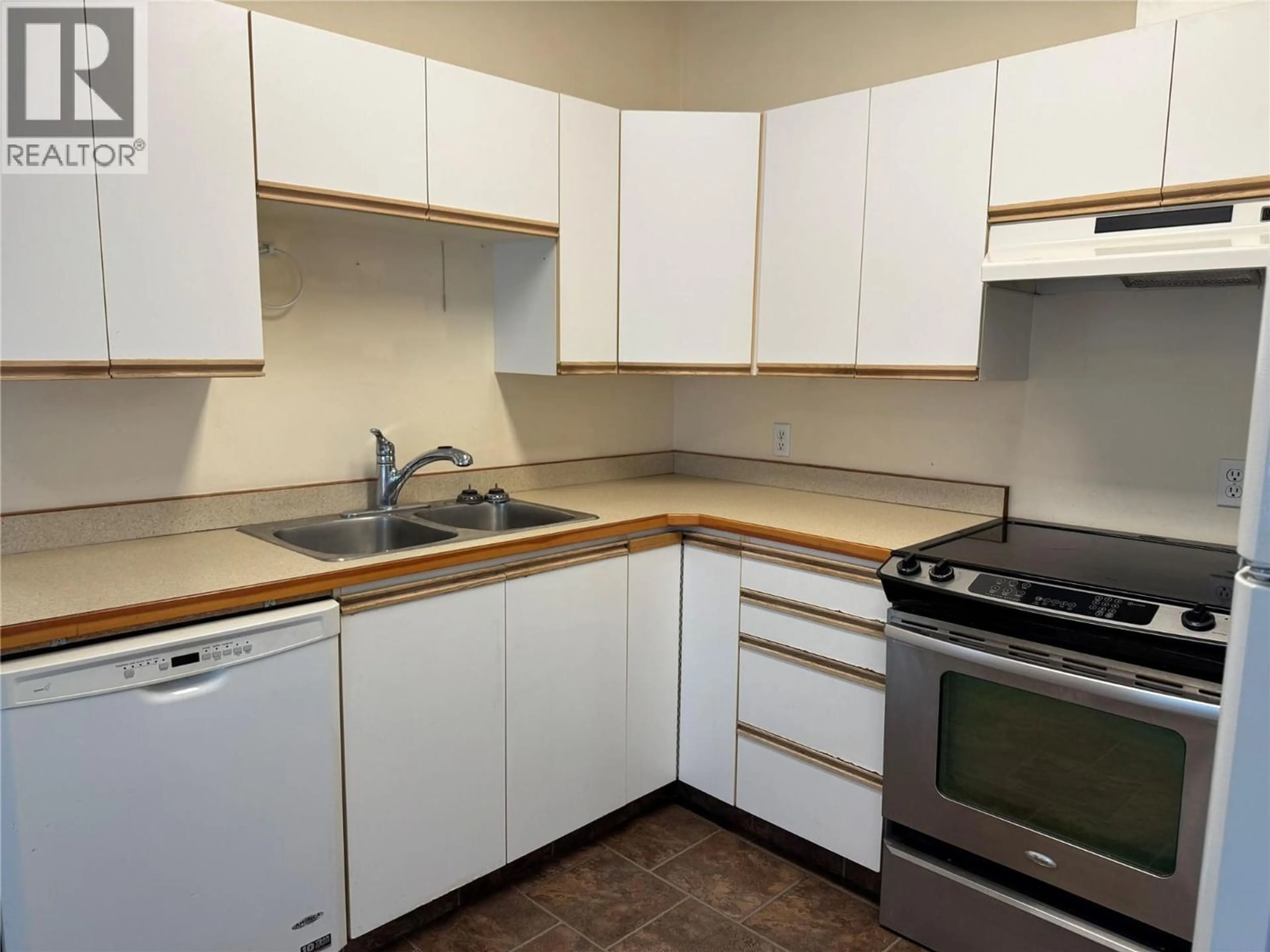 Standard kitchen, wood/laminate floor for 2202 QUILCHENA AVENUE, Merritt British Columbia V1K1B8