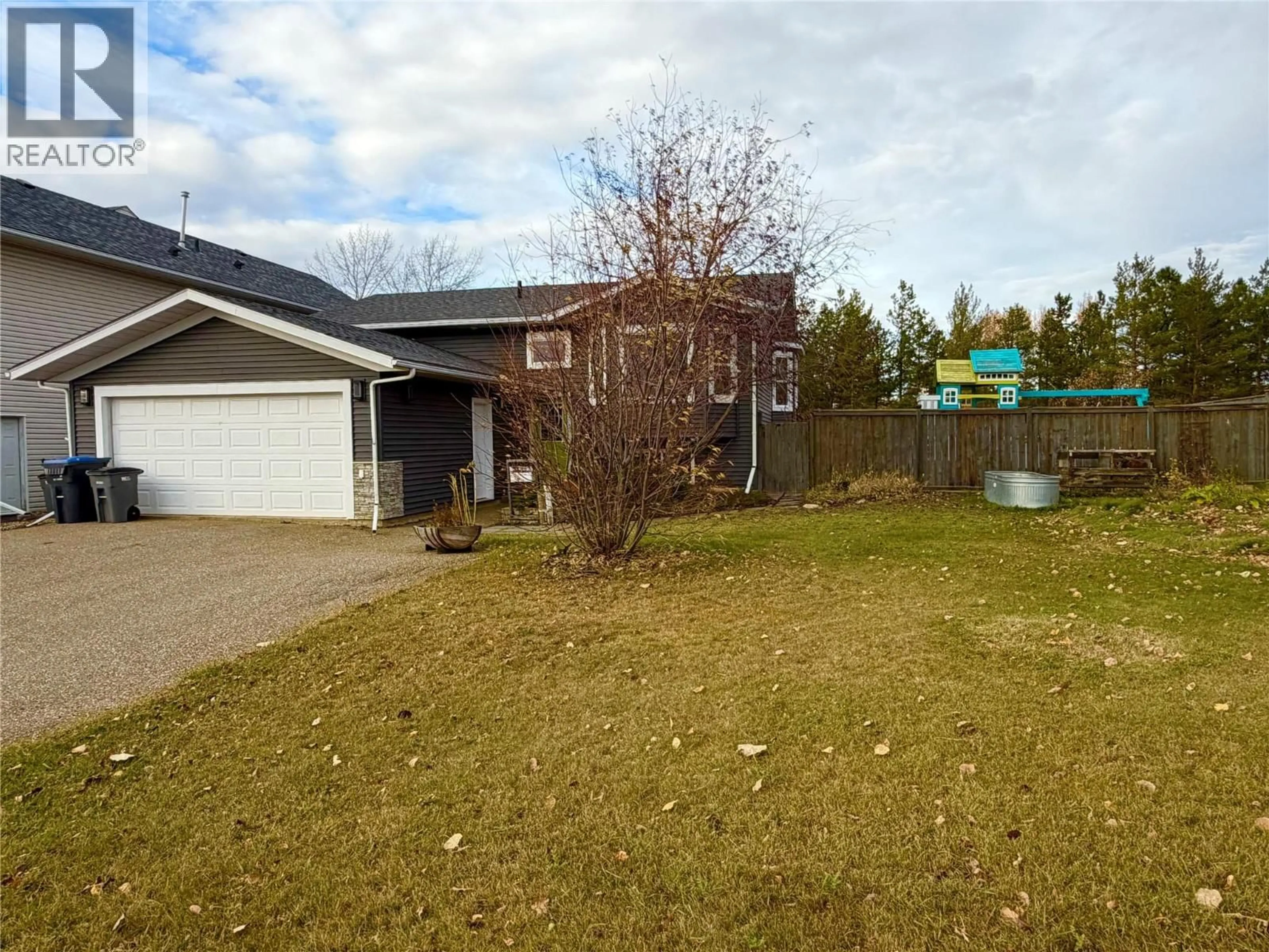 A pic from outside/outdoor area/front of a property/back of a property/a pic from drone, street for 1620 LORAN DRIVE, Dawson Creek British Columbia V1G4Y1