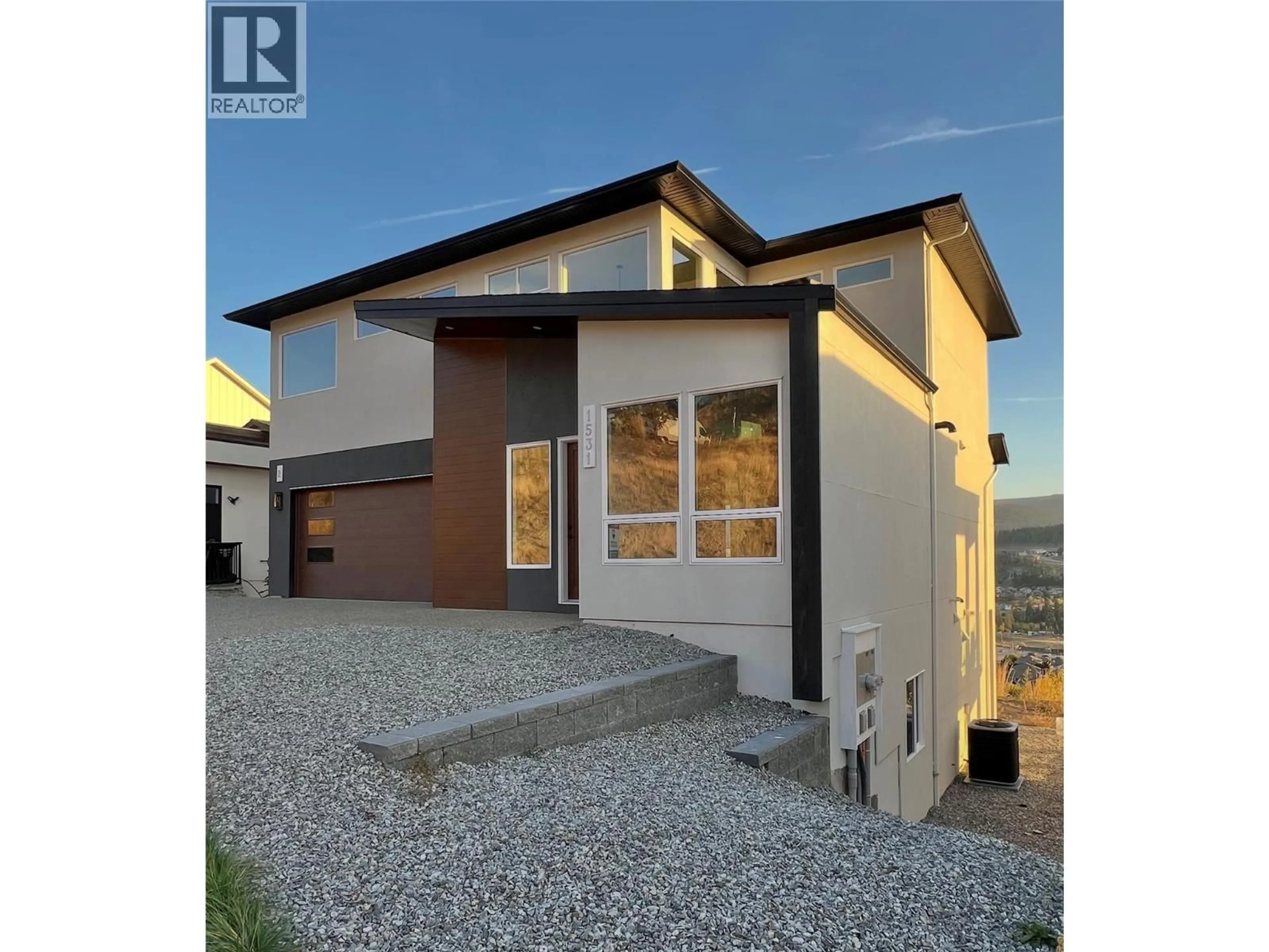 Home with vinyl exterior material, street for 1531 FAIRWOOD LANE, Kelowna British Columbia V1P0A4