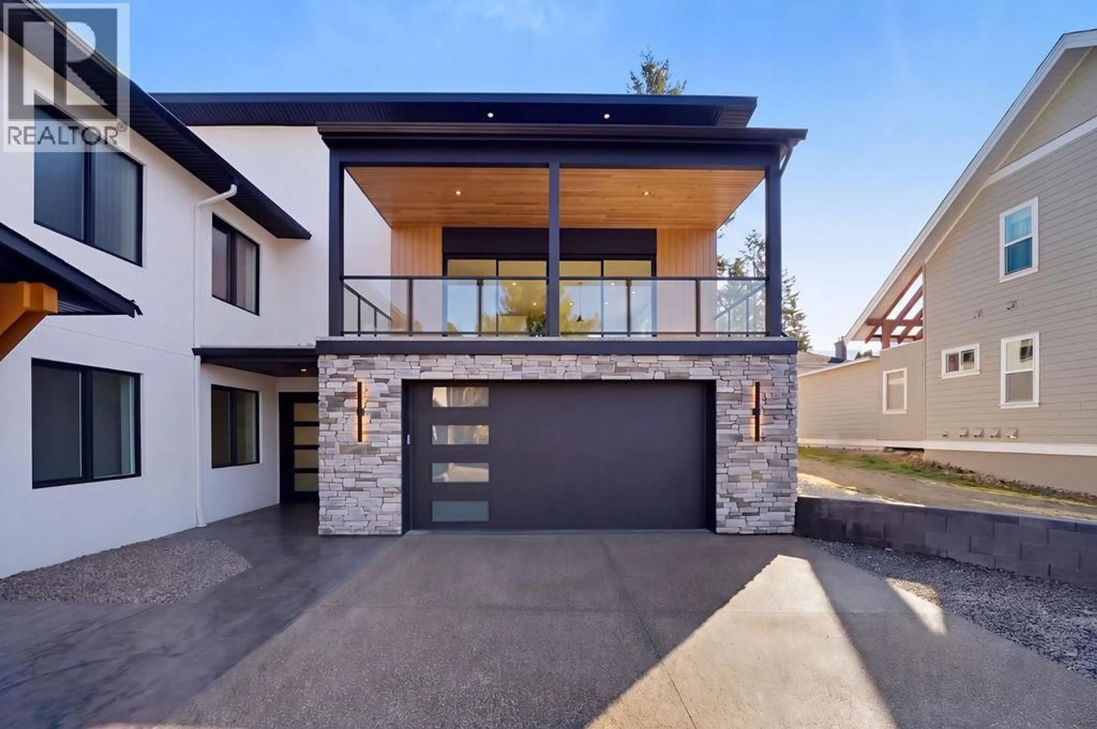 Home with brick exterior material, street for 2 - 1080 9 AVENUE NORTHEAST, Salmon Arm British Columbia V1E4A8