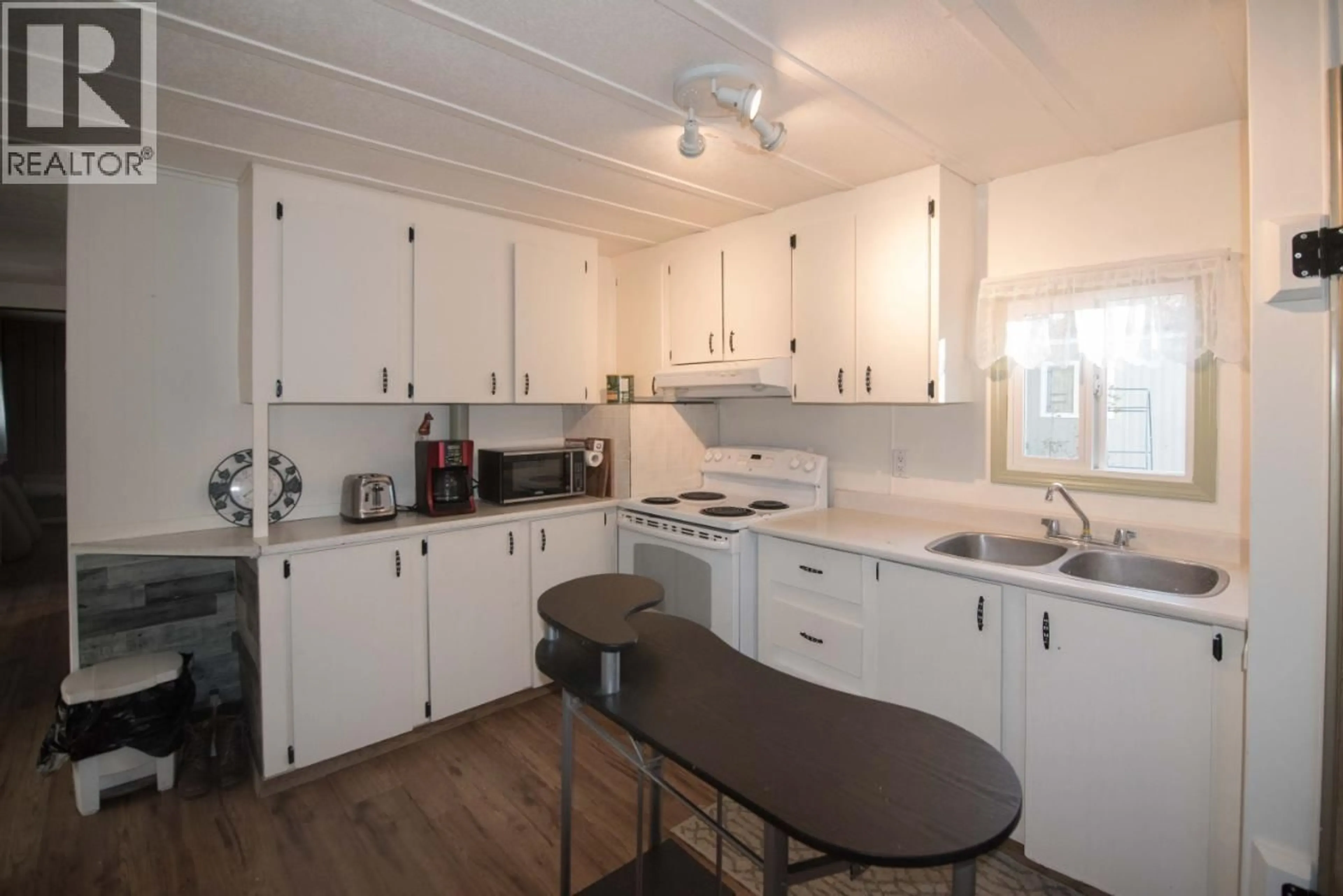 Standard kitchen, wood/laminate floor for 13 - 1055 OLD CARIBOO ROAD, Cache Creek British Columbia V0K1H0