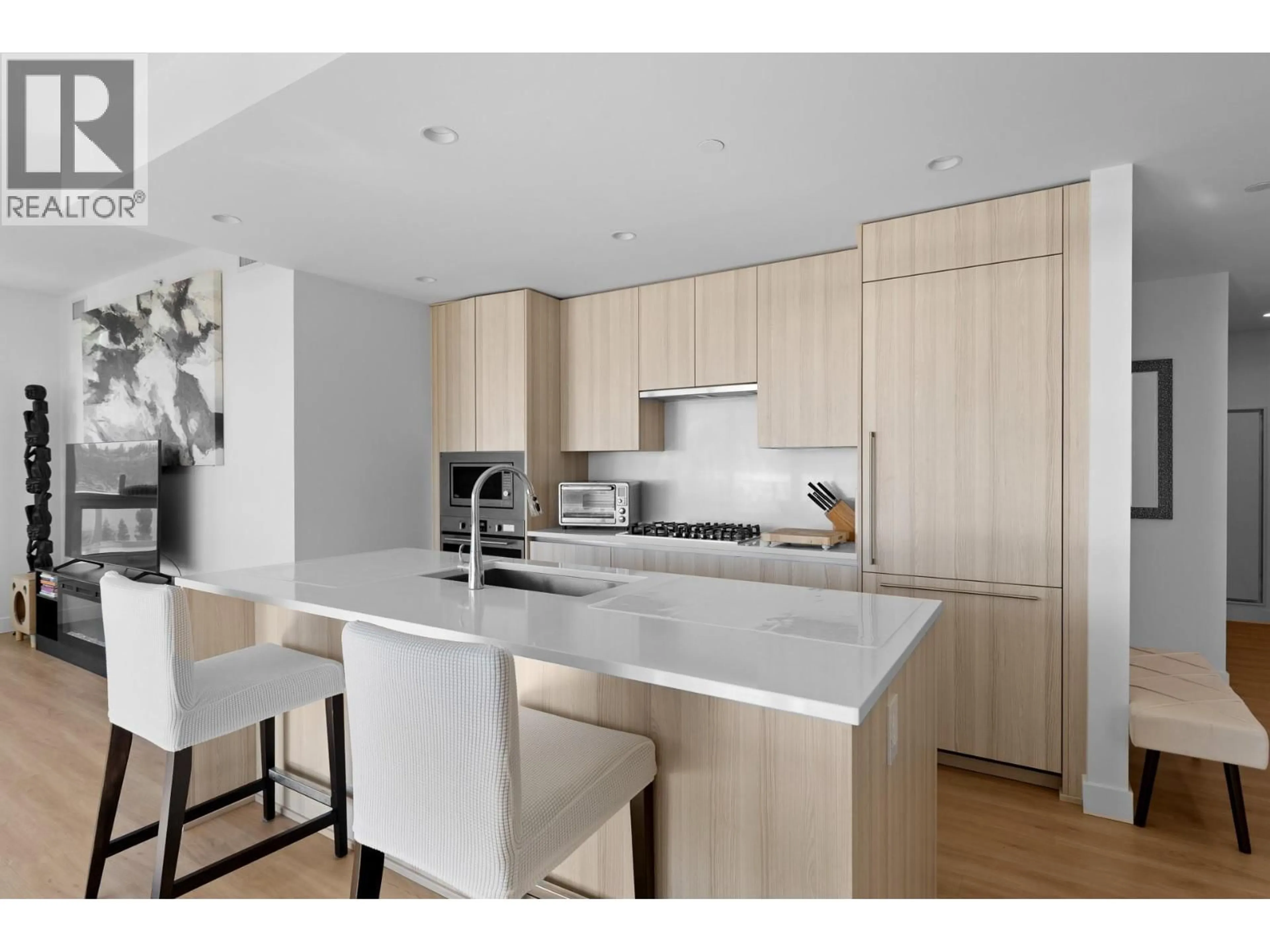 Contemporary kitchen, wood/laminate floor for 1407 - 238 LEON AVENUE, Kelowna British Columbia V1Y0N6
