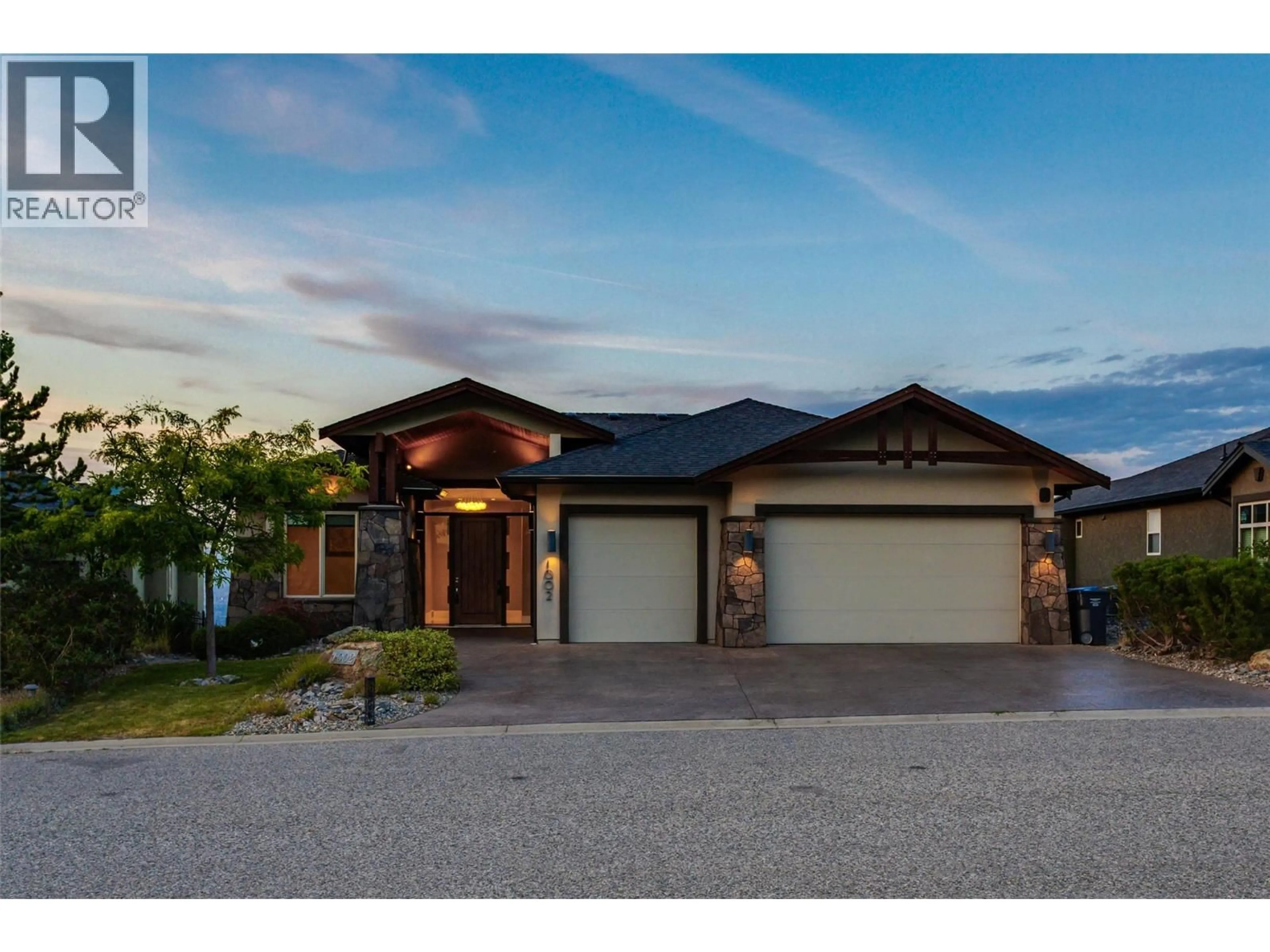 Home with brick exterior material, street for 1002 HEWETSON AVENUE, Kelowna British Columbia V1W5H8