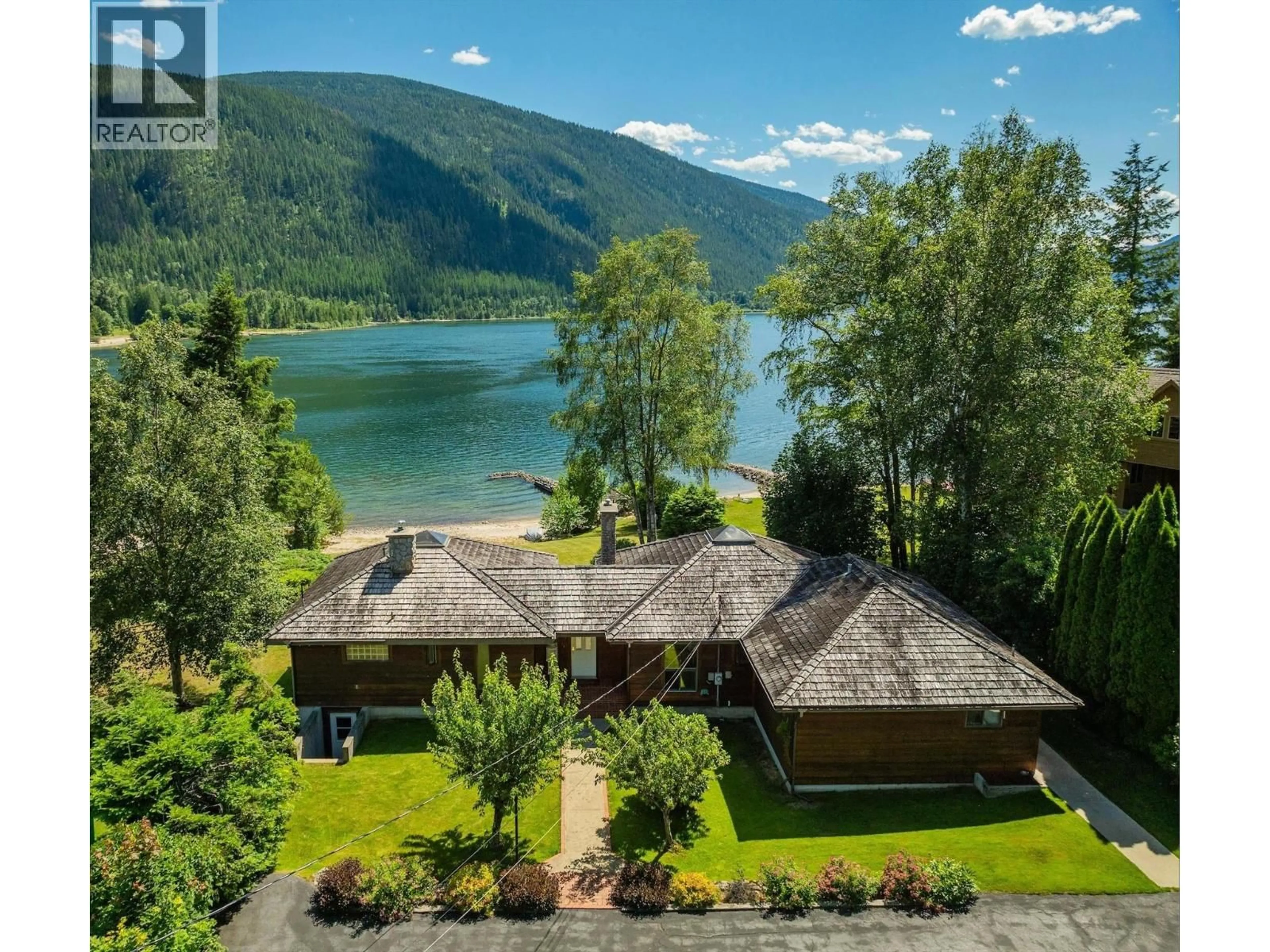 A pic from outside/outdoor area/front of a property/back of a property/a pic from drone, water/lake/river/ocean view for 3918 MACGREGOR WEST ROAD, Nelson British Columbia V1L6M8