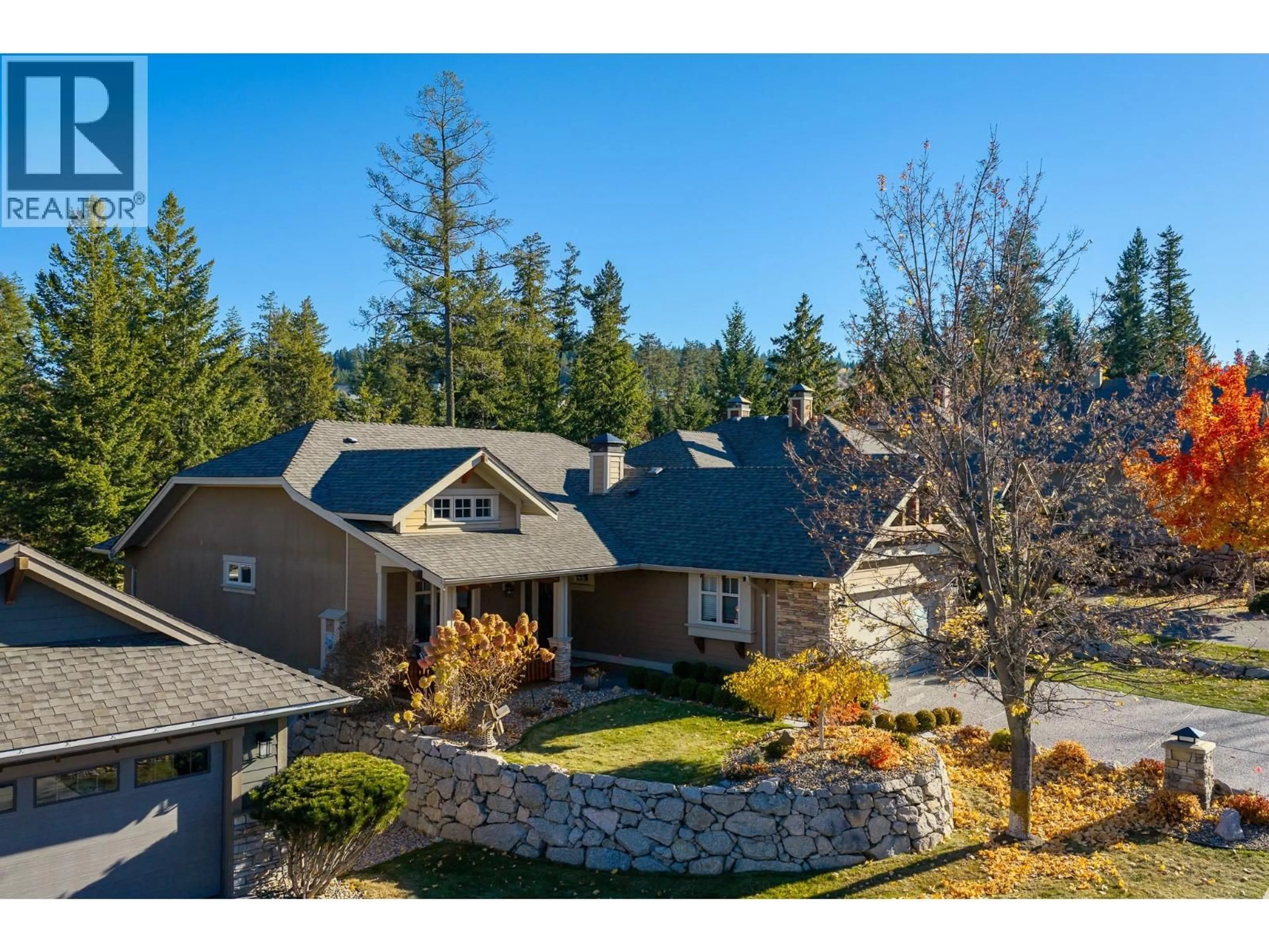 A pic from outside/outdoor area/front of a property/back of a property/a pic from drone, mountain view for 142 DORMIE PARK CRESCENT, Vernon British Columbia V1H1Y7