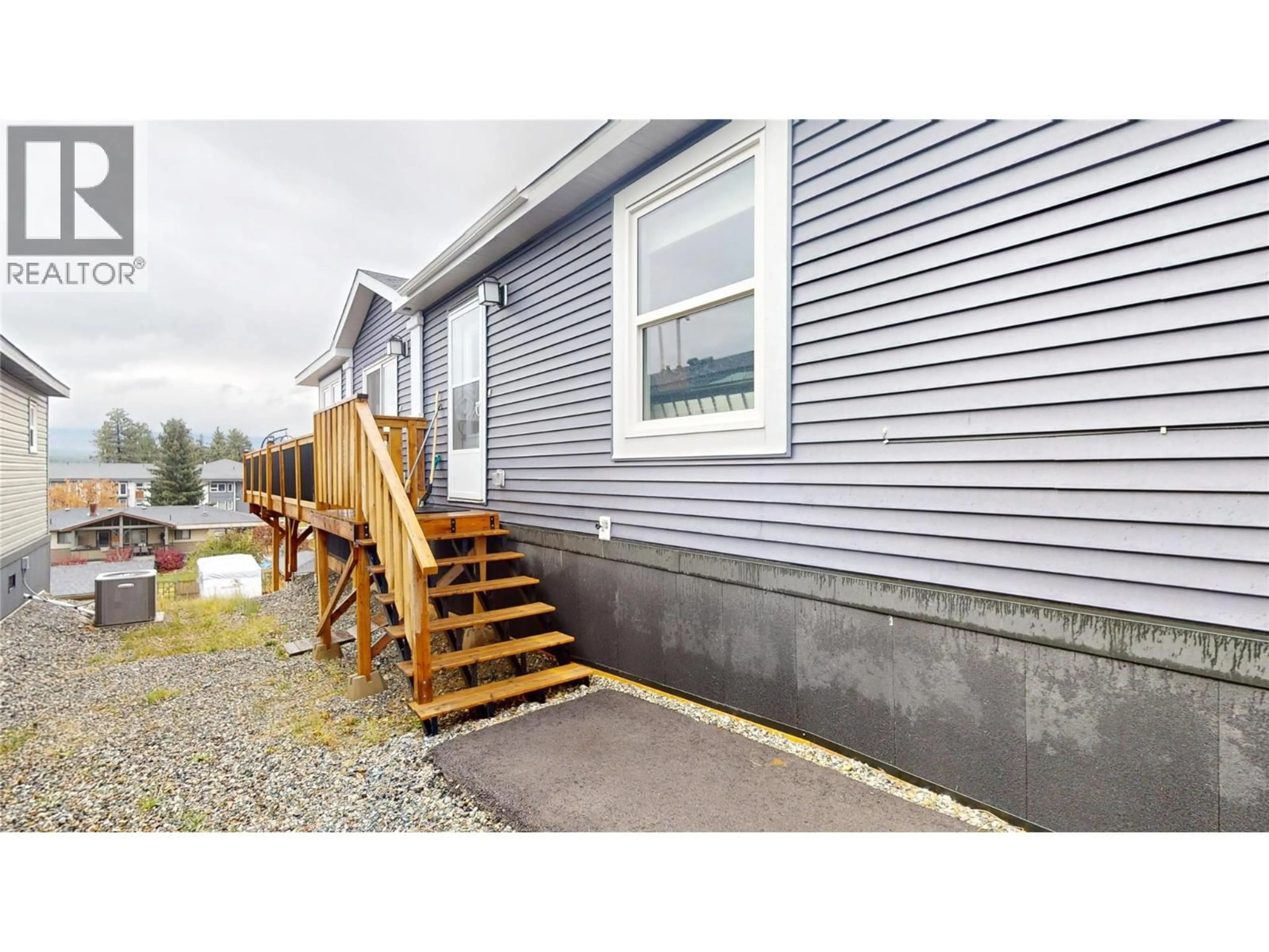 Home with vinyl exterior material, street for 517 PAGURUT AVENUE WEST, Cranbrook British Columbia V1C0G5