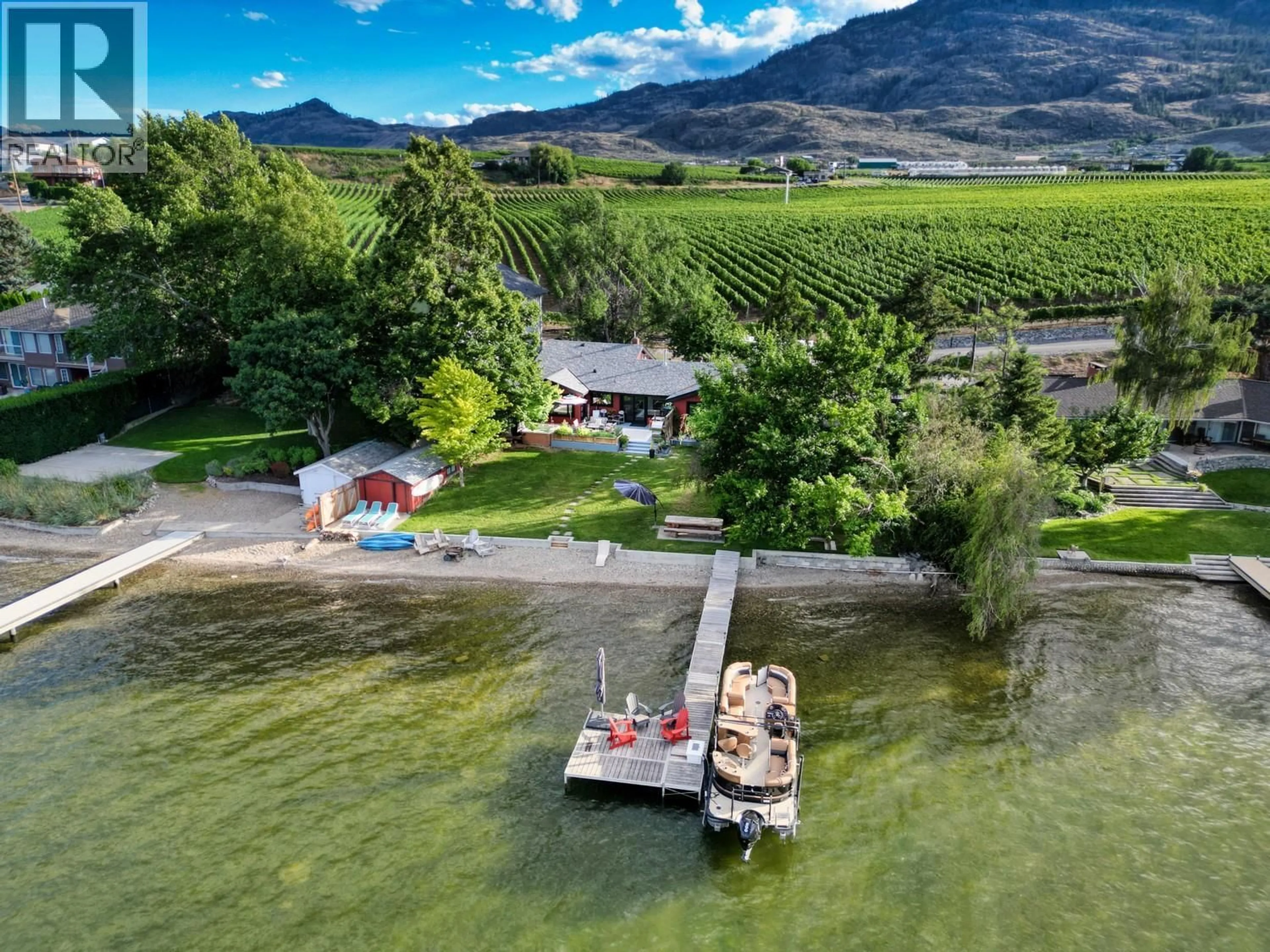 A pic from outside/outdoor area/front of a property/back of a property/a pic from drone, water/lake/river/ocean view for 10617 81ST STREET, Osoyoos British Columbia V0H1V2