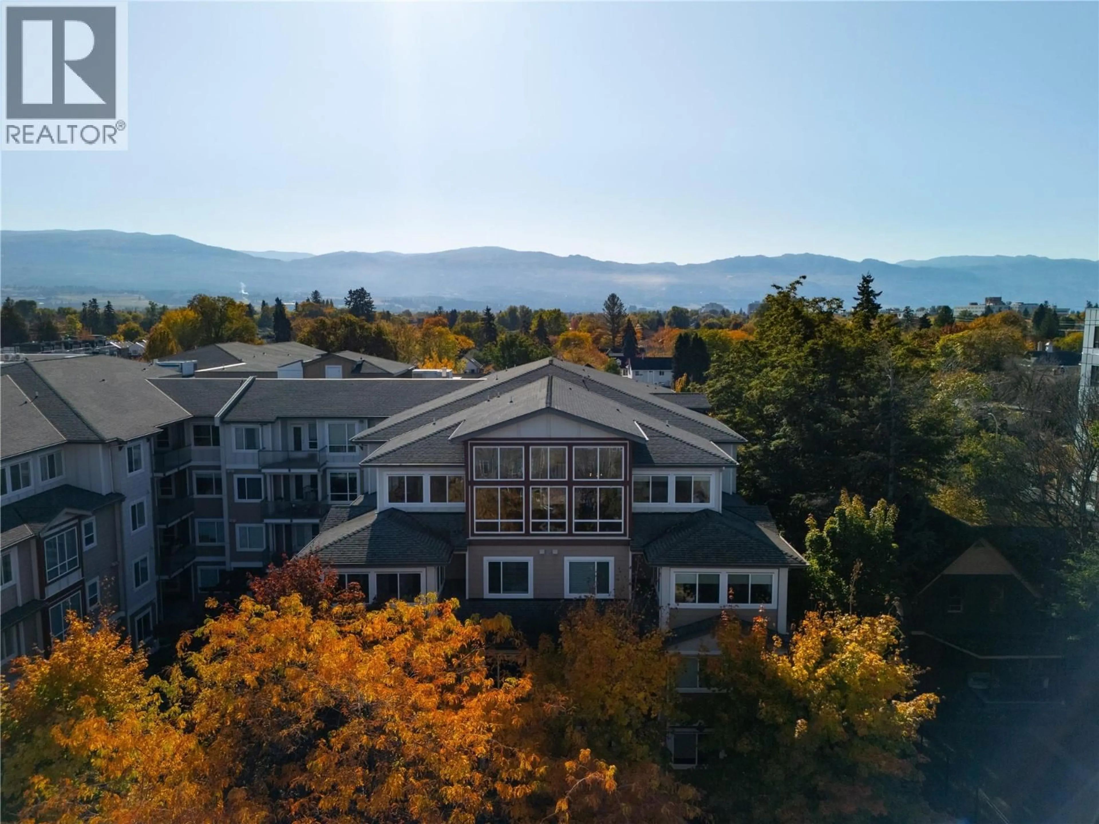 A pic from outside/outdoor area/front of a property/back of a property/a pic from drone, mountain view for 414 - 850 SAUCIER AVENUE, Kelowna British Columbia V1Y6A3