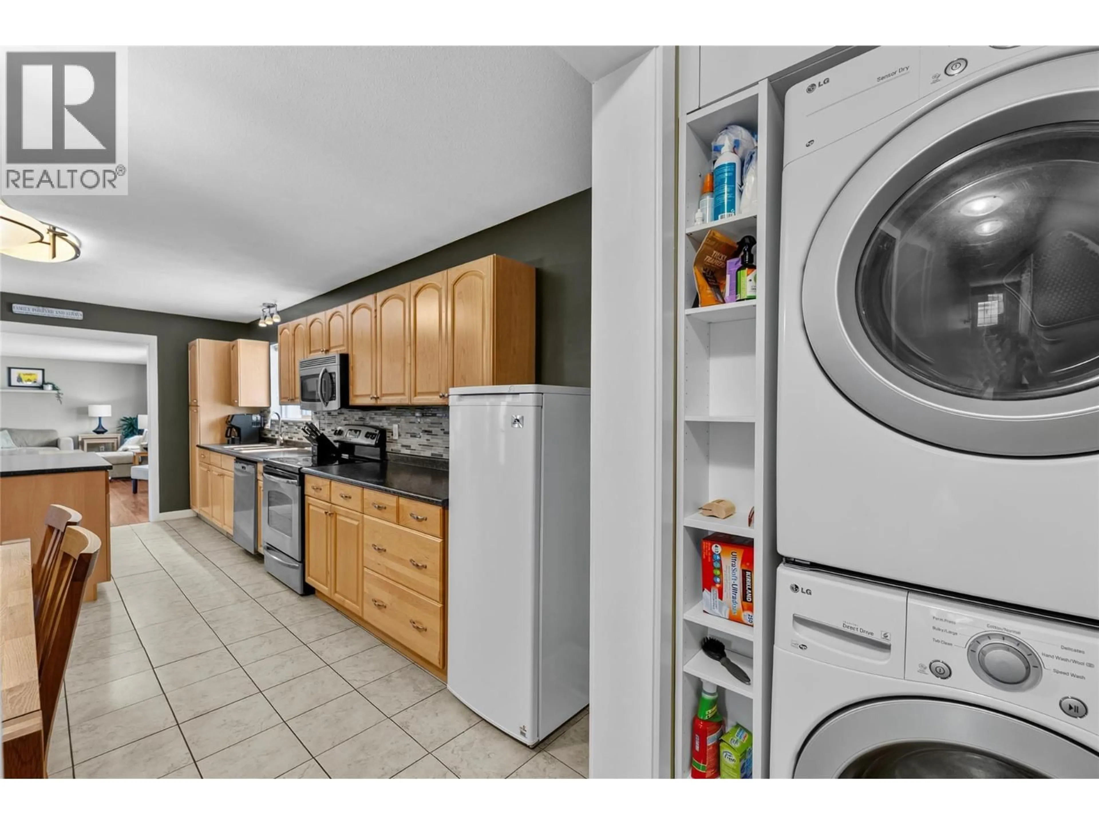 Kitchen with laundary machines, ceramic/tile floor for 2045 VALLEYVIEW DRIVE, Kamloops British Columbia V2C4C3