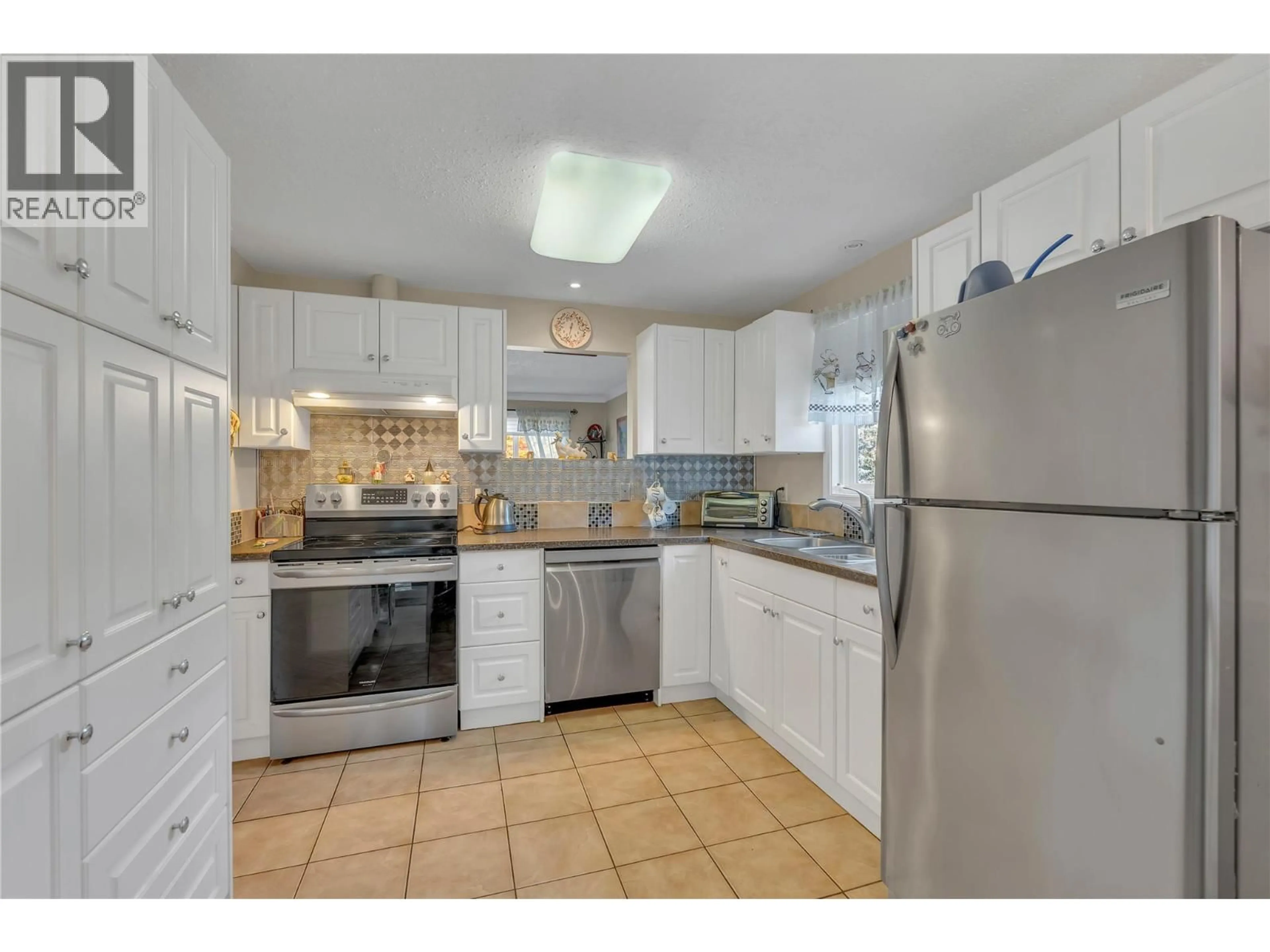 Standard kitchen, ceramic/tile floor for 6 - 10907 JUBILEE ROAD WEST, Summerland British Columbia V0H1Z0