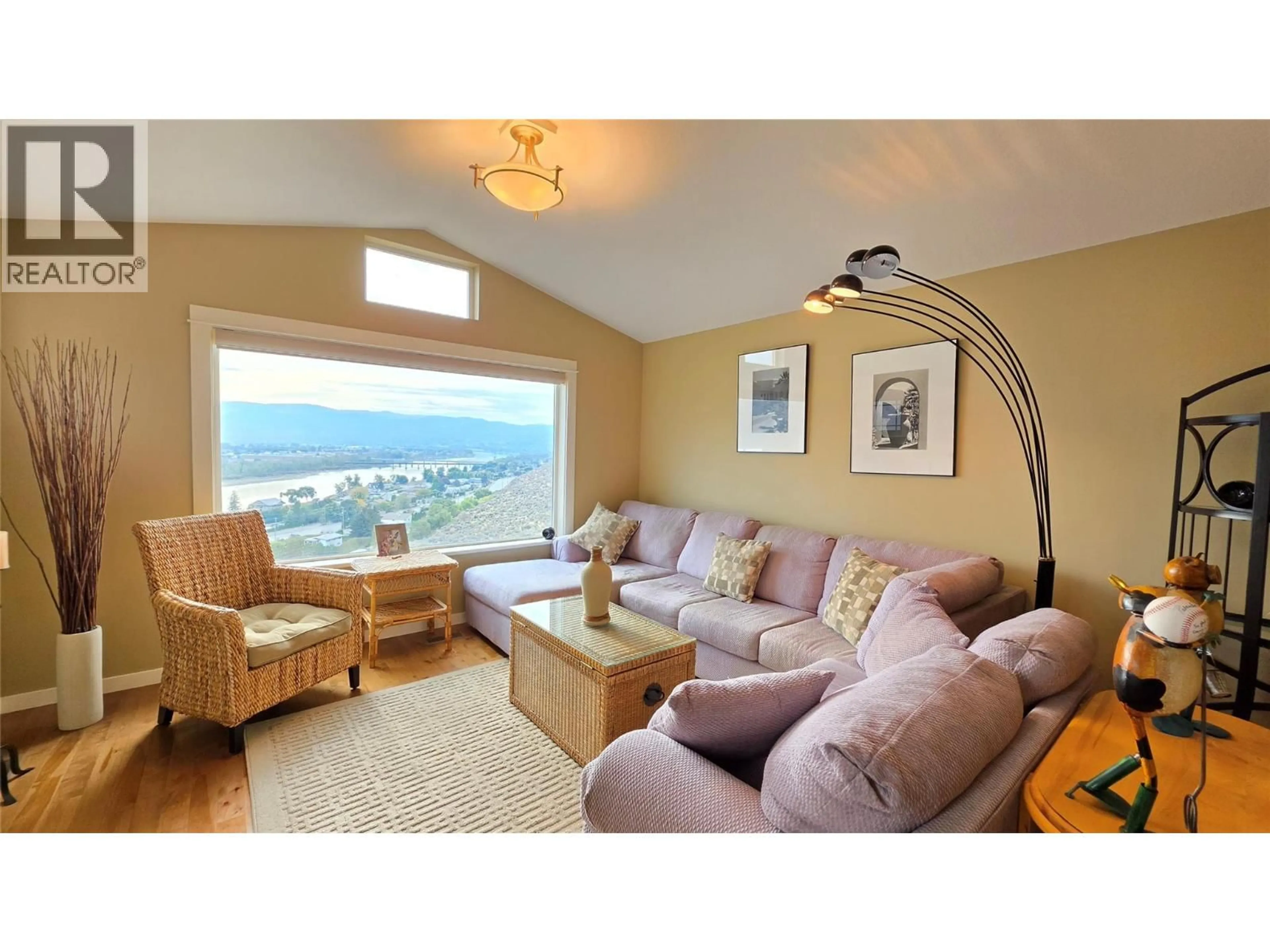 Living room with furniture, wood/laminate floor for 14 900 STAGECOACH DRIVE, Kamloops British Columbia V2B0B7
