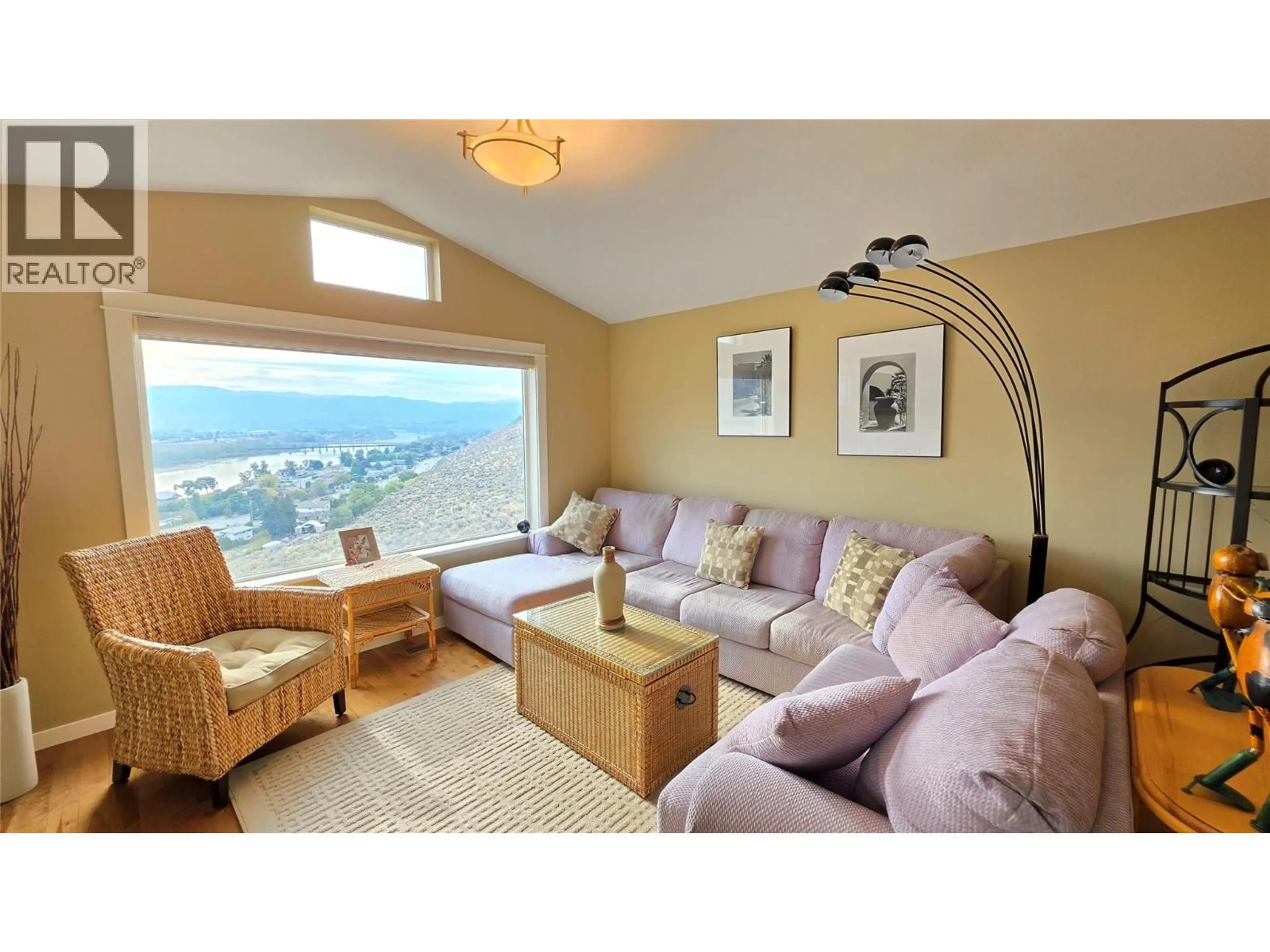 Living room with furniture, wood/laminate floor for 14 900 STAGECOACH DRIVE, Kamloops British Columbia V2B0B7