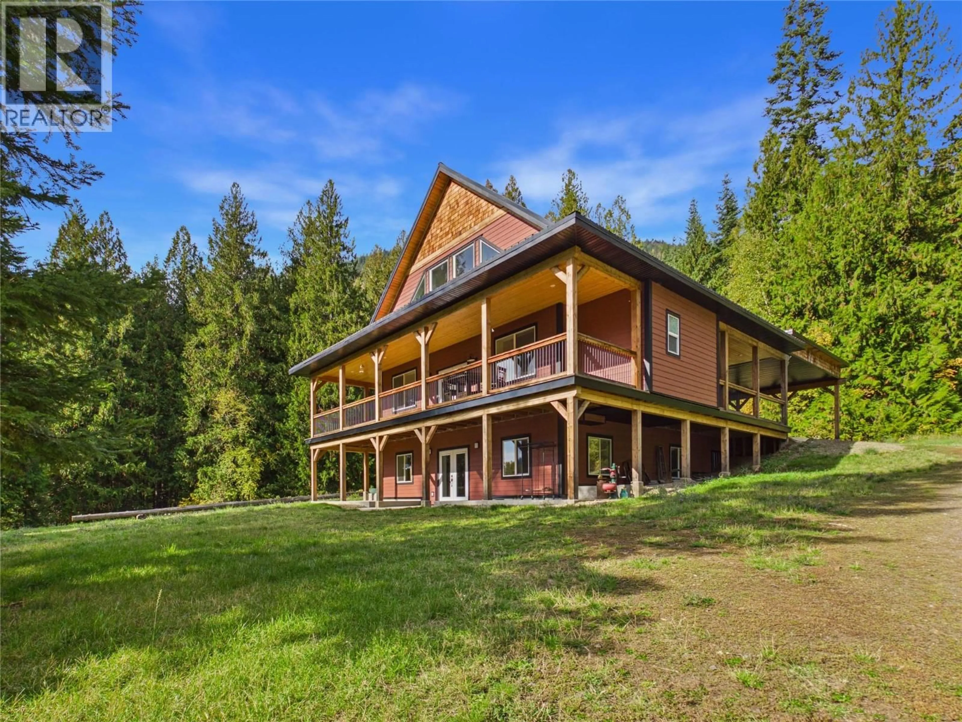 A pic from outside/outdoor area/front of a property/back of a property/a pic from drone, unknown for 8774 HIGHWAY 6 HIGHWAY, Salmo British Columbia V0G1Z0
