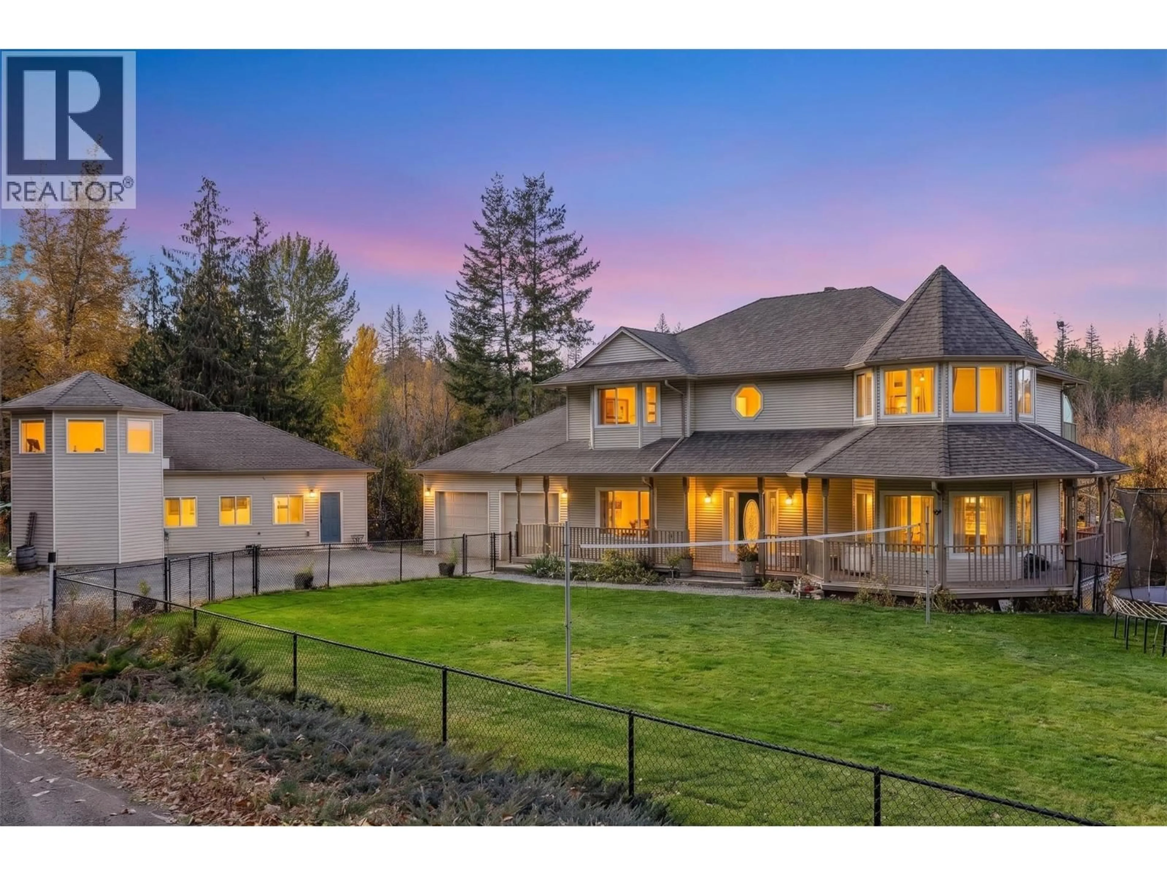 A pic from outside/outdoor area/front of a property/back of a property/a pic from drone, mountain view for 4614 JUNE SPRINGS ROAD, Kelowna British Columbia V1W4C8