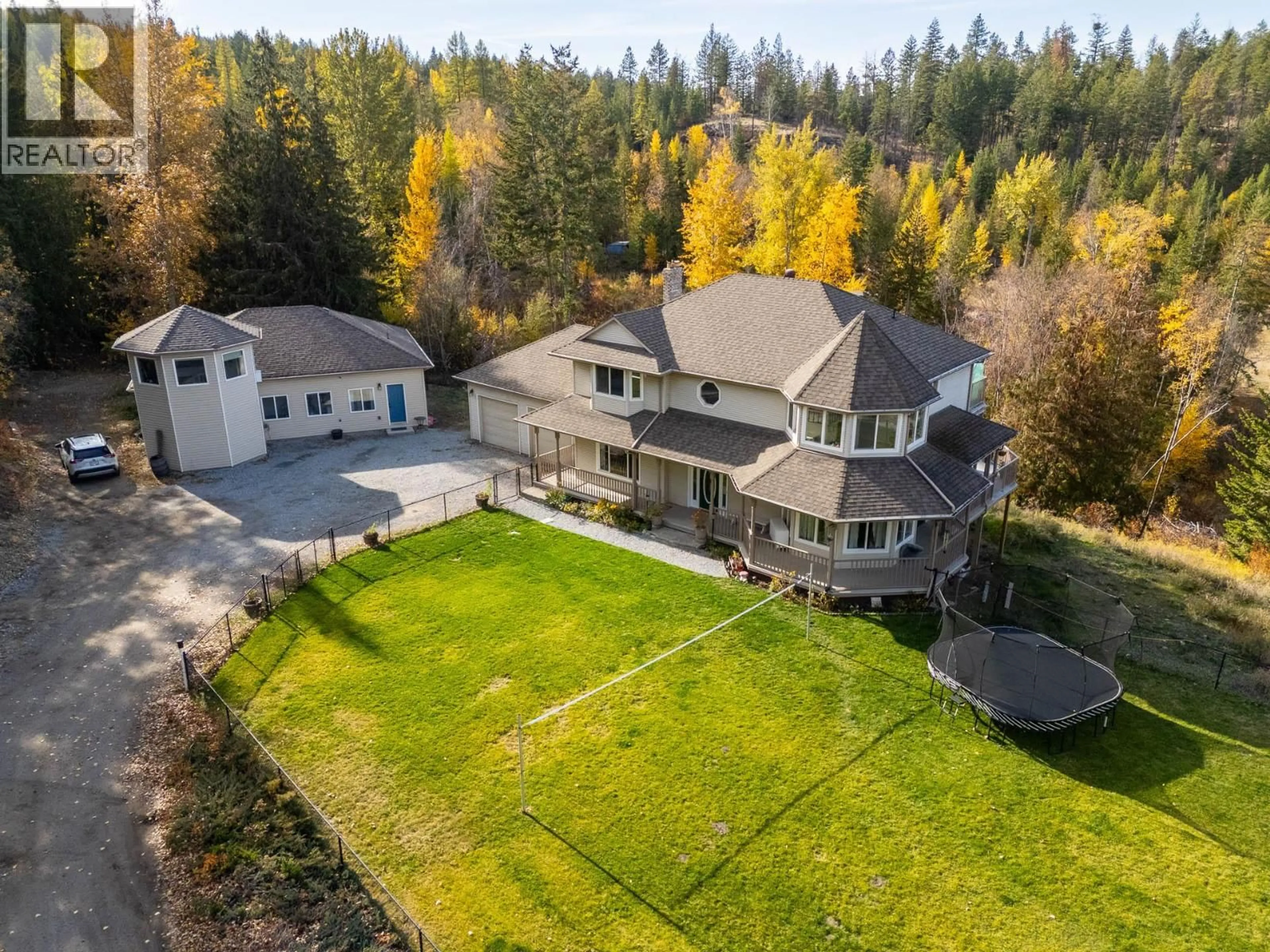 A pic from outside/outdoor area/front of a property/back of a property/a pic from drone, unknown for 4614 JUNE SPRINGS ROAD, Kelowna British Columbia V1W4C8