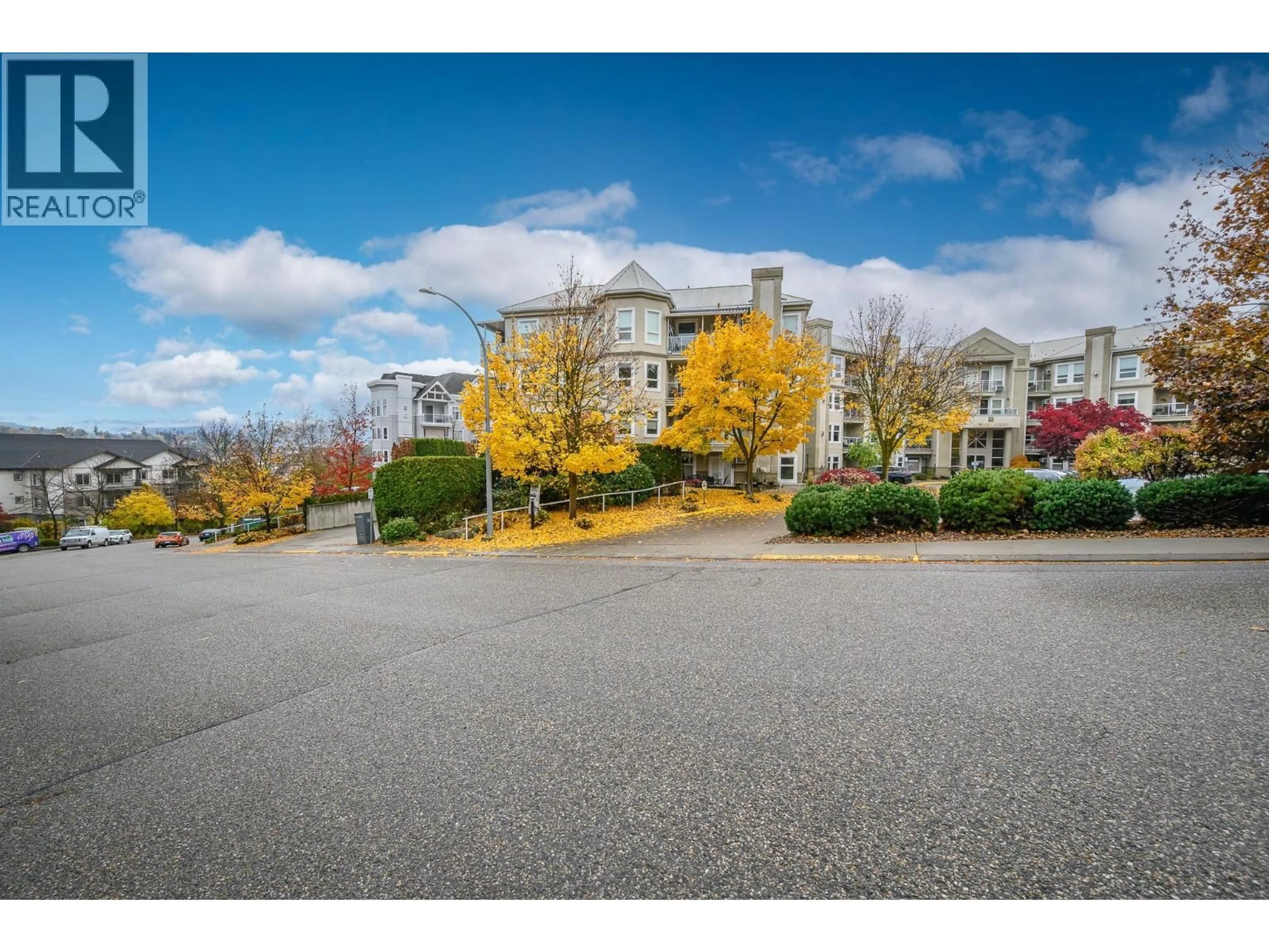 A pic from outside/outdoor area/front of a property/back of a property/a pic from drone, street for 404 - 3300 CENTENNIAL DRIVE, Vernon British Columbia V1T9M5