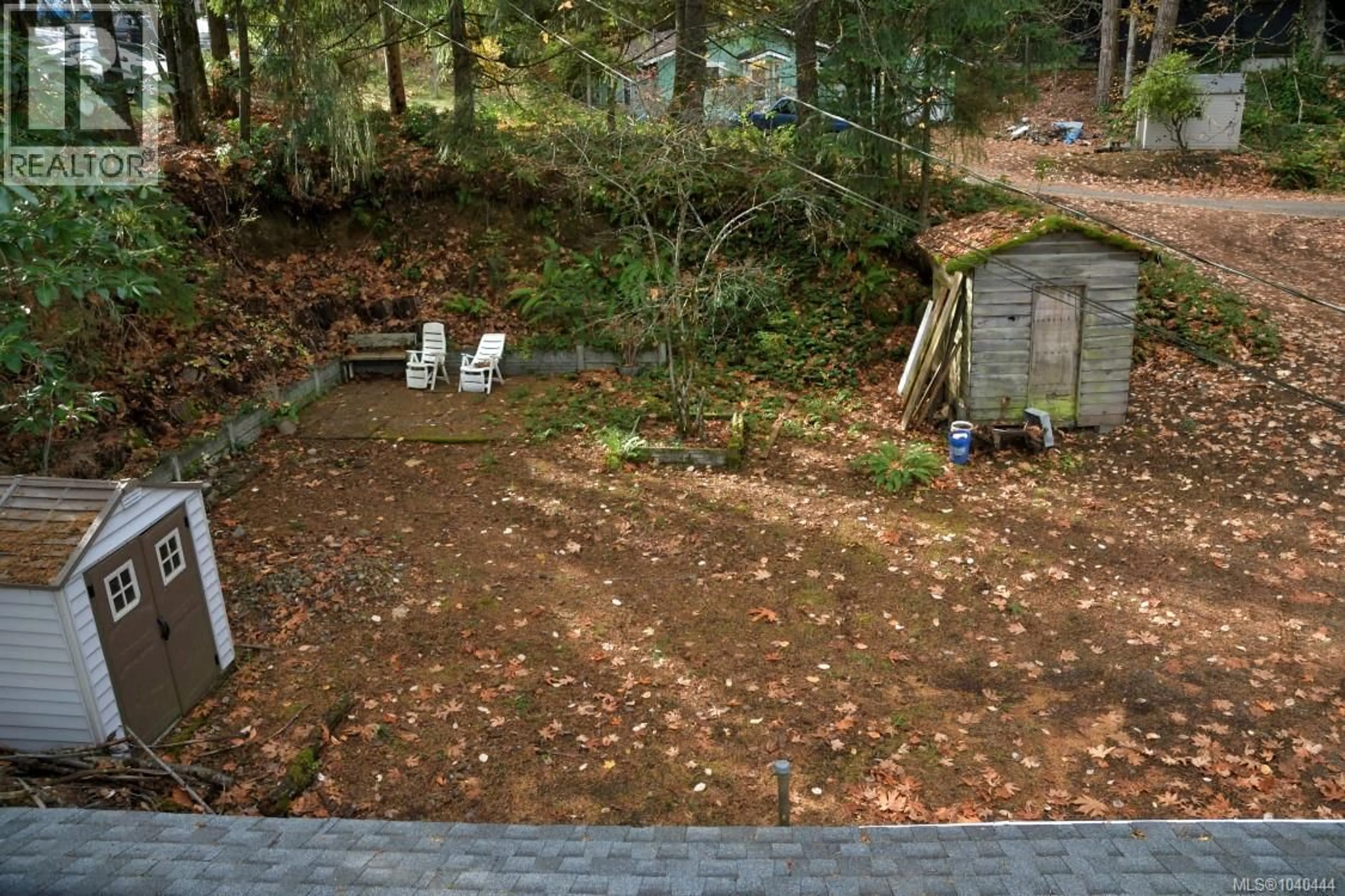 A pic from outside/outdoor area/front of a property/back of a property/a pic from drone, forest/trees view for 1154 2ND AVENUE, Ladysmith British Columbia V9G1A4