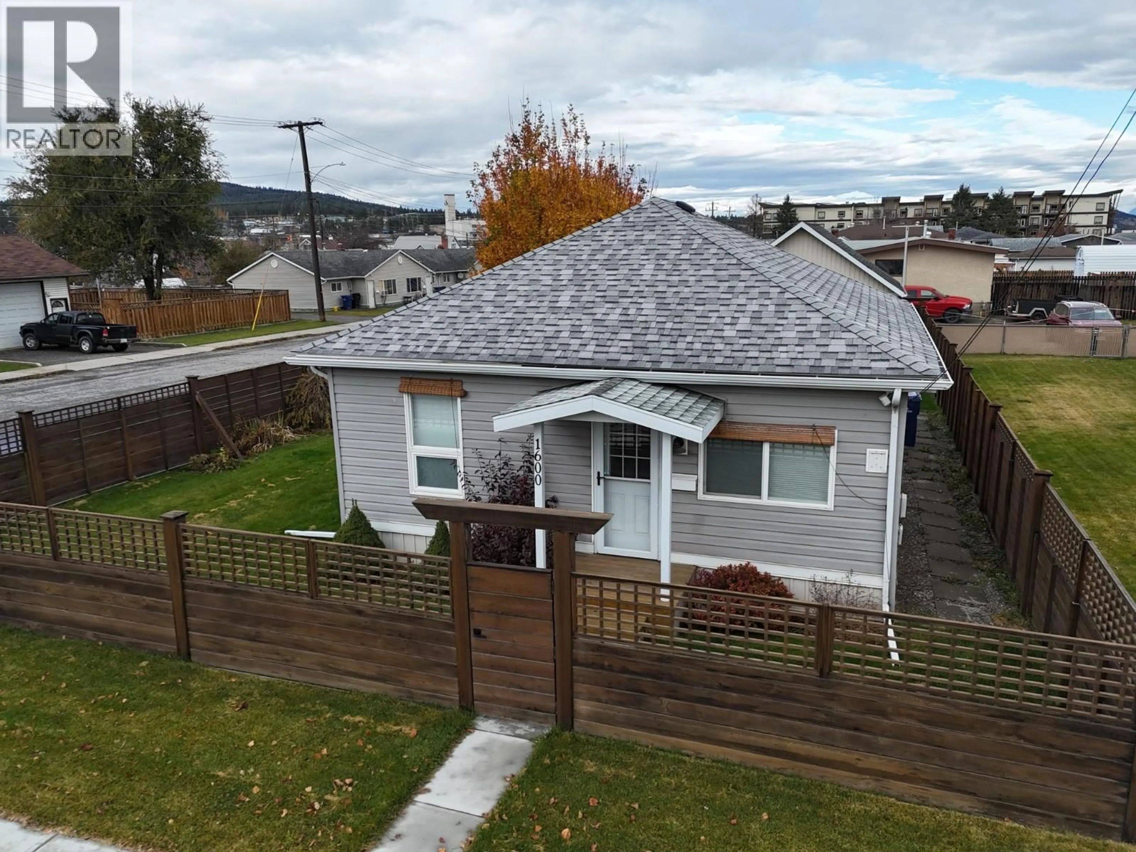 A pic from outside/outdoor area/front of a property/back of a property/a pic from drone, street for 1600 4TH STREET NORTH, Cranbrook British Columbia V1C3L7