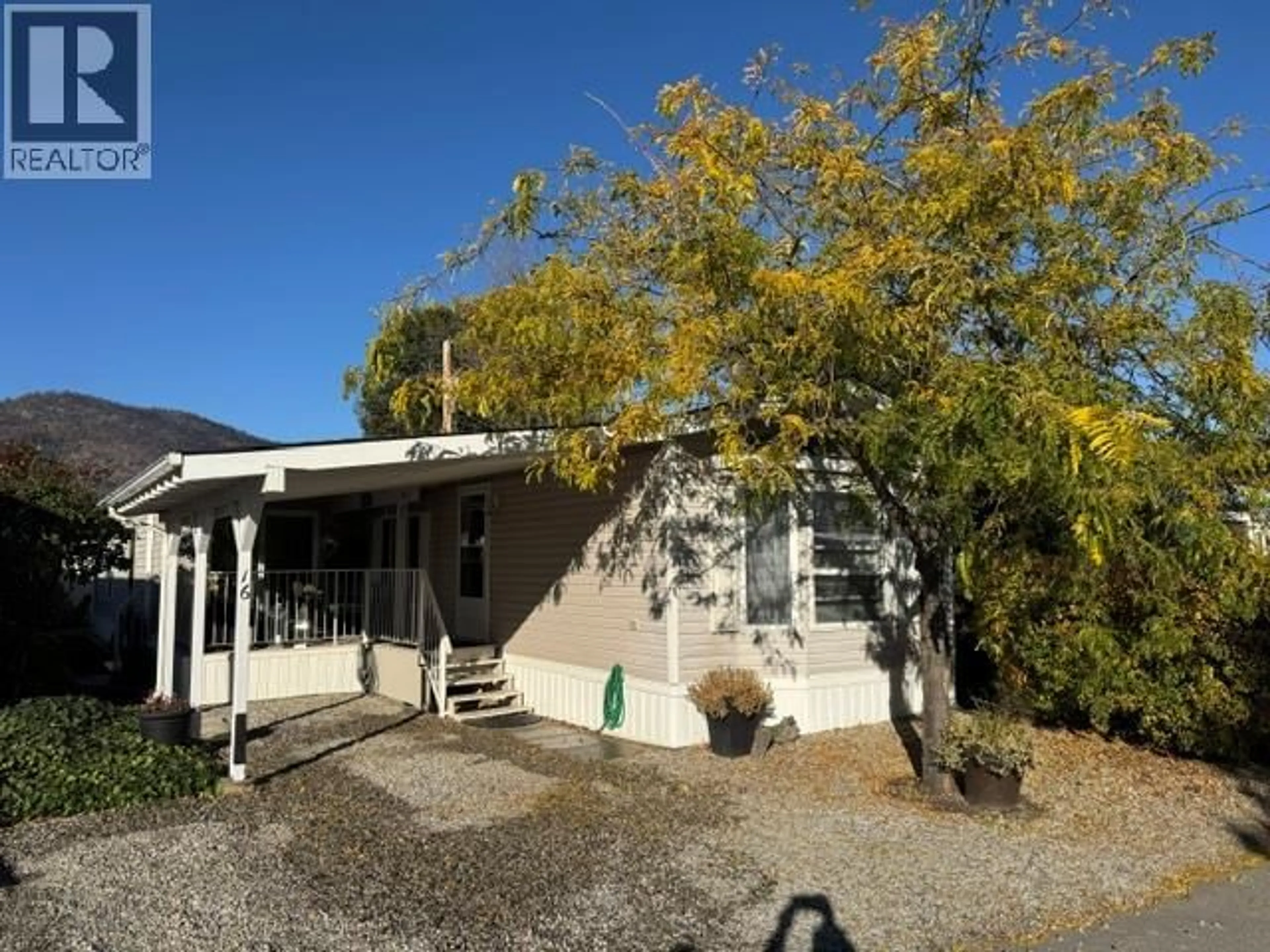 A pic from outside/outdoor area/front of a property/back of a property/a pic from drone, street for 16 - 8712 STEUART STREET, Summerland British Columbia V0H1Z6