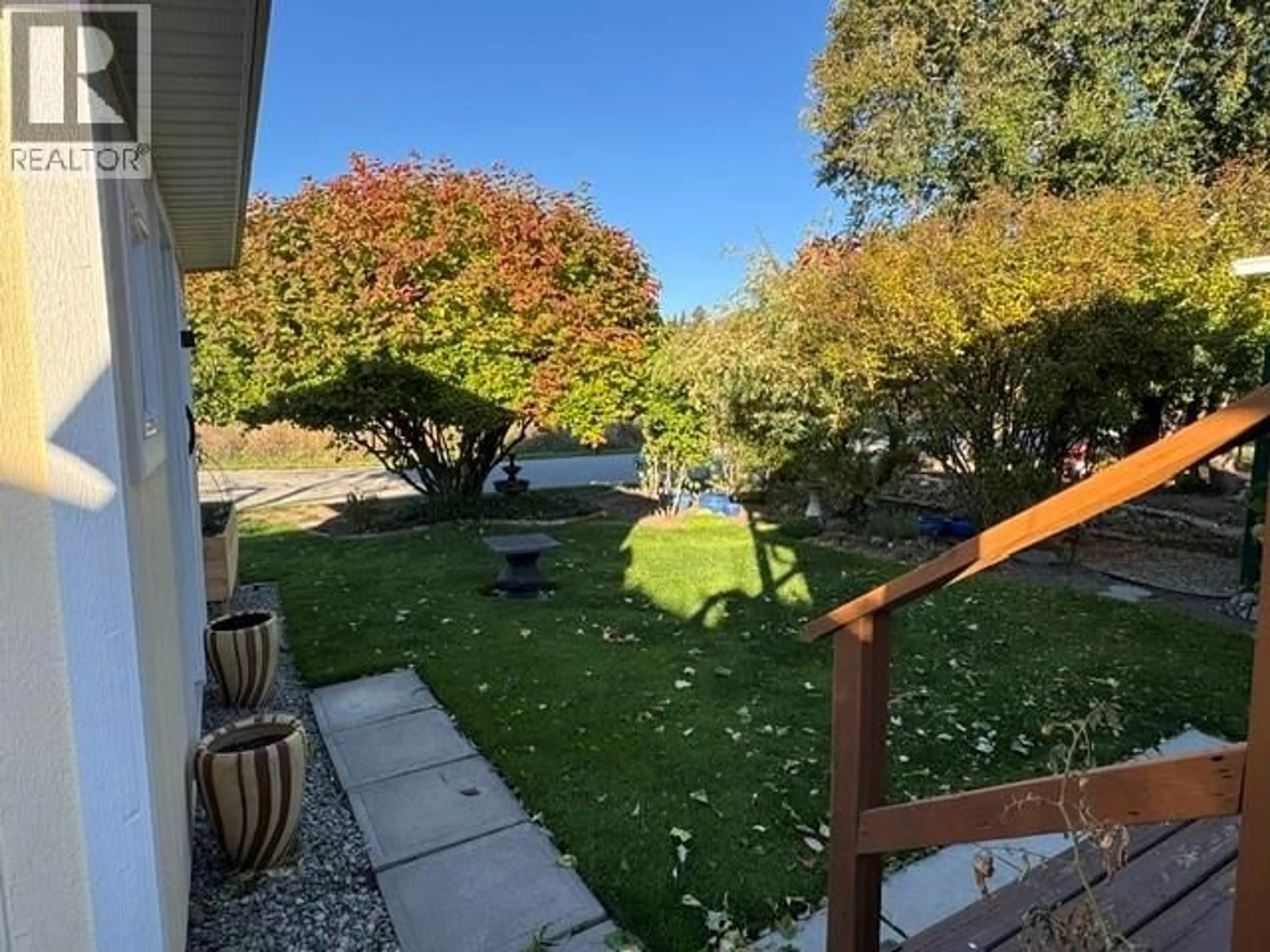 A pic from outside/outdoor area/front of a property/back of a property/a pic from drone, water/lake/river/ocean view for 16 - 8712 STEUART STREET, Summerland British Columbia V0H1Z6