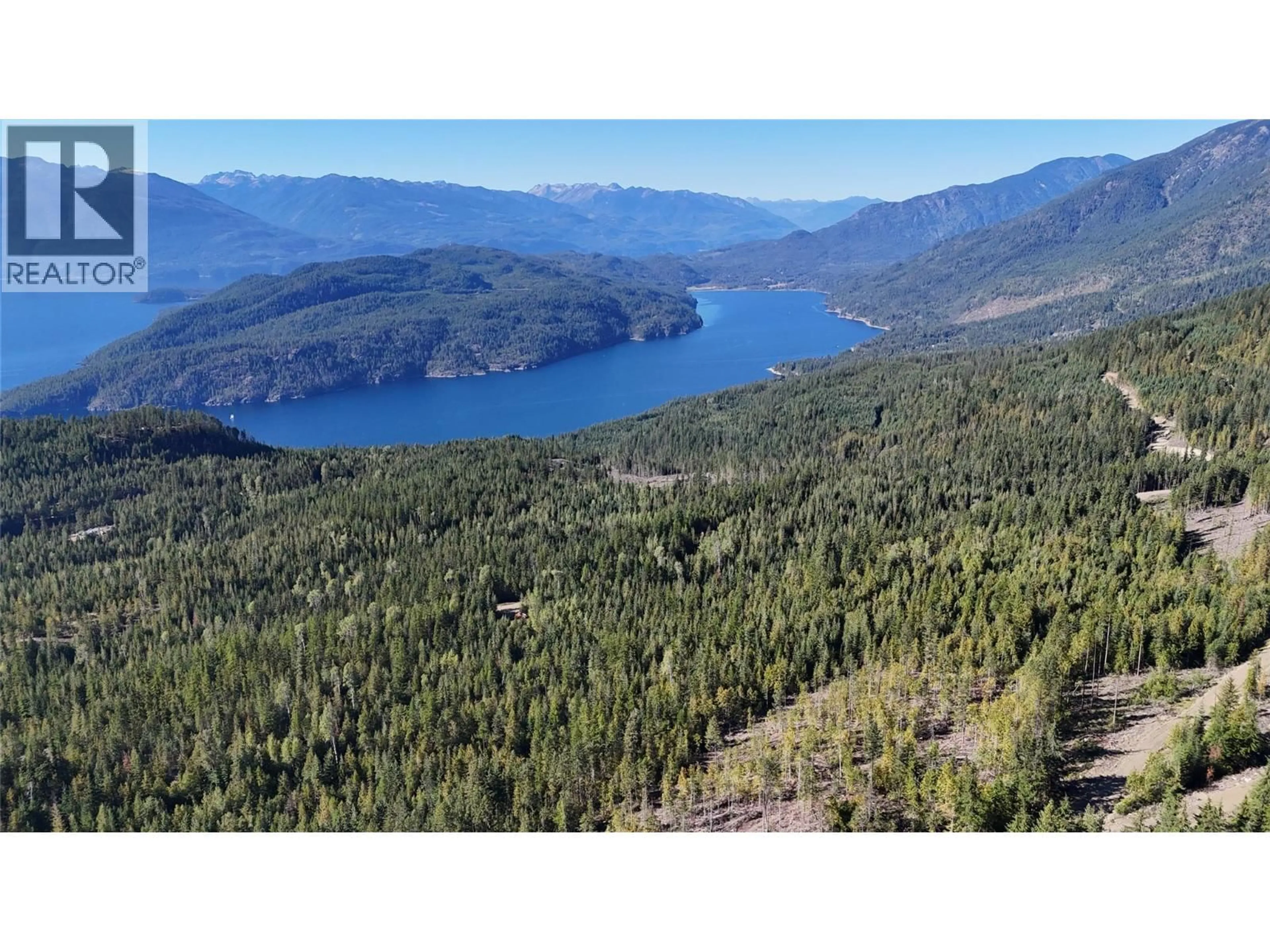 A pic from outside/outdoor area/front of a property/back of a property/a pic from drone, water/lake/river/ocean view for SL 83 & 91 MACFARLANE 27 ROAD, Gray Creek British Columbia V0B1S0