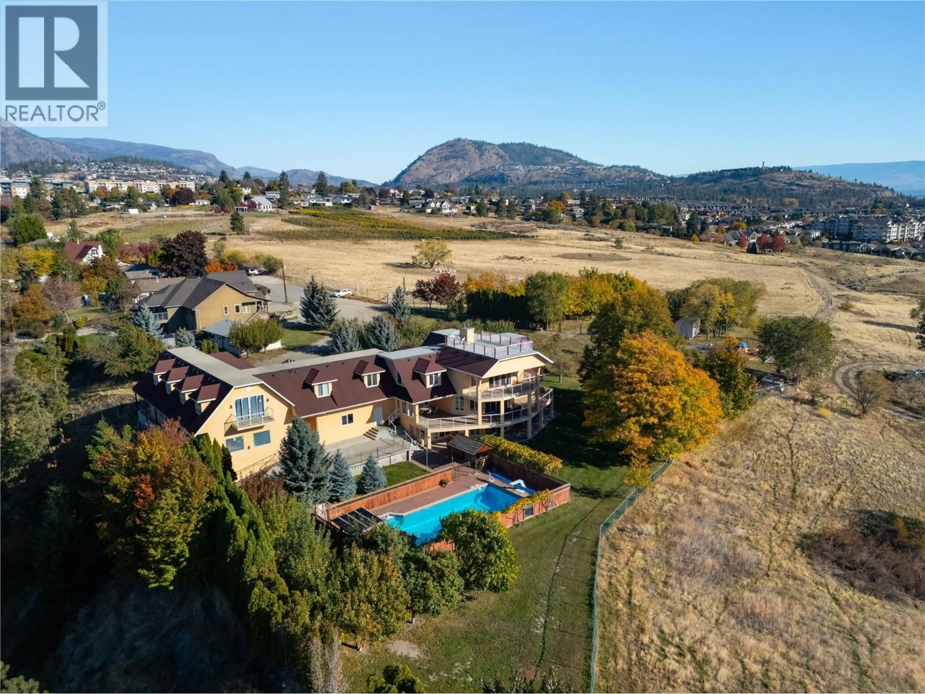 A pic from outside/outdoor area/front of a property/back of a property/a pic from drone, mountain view for 3820 WETTON ROAD, West Kelowna British Columbia V4T2C1