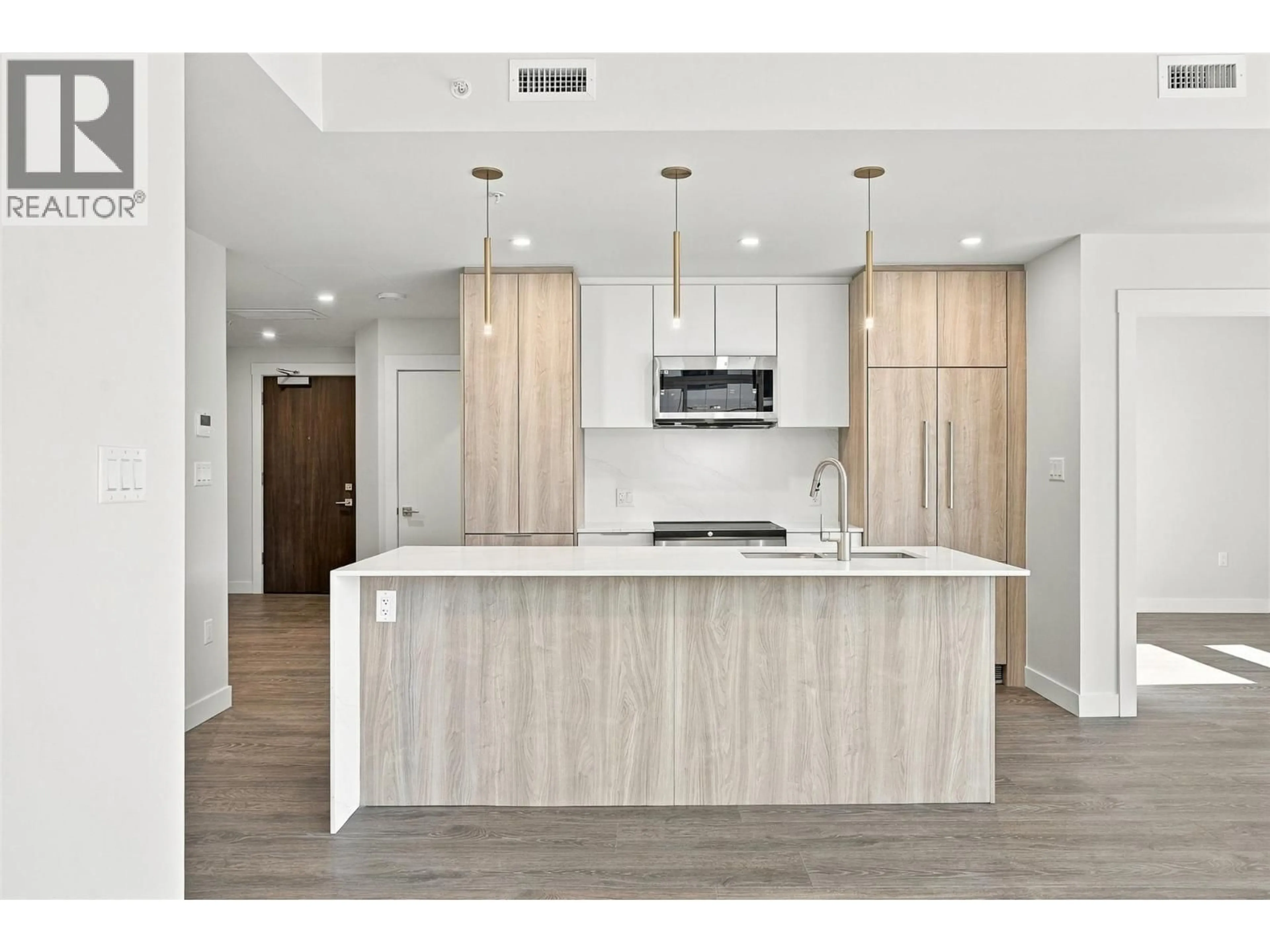 Open concept kitchen, wood/laminate floor for 902 - 460 NICOLA STREET, Kamloops British Columbia V2C0N2
