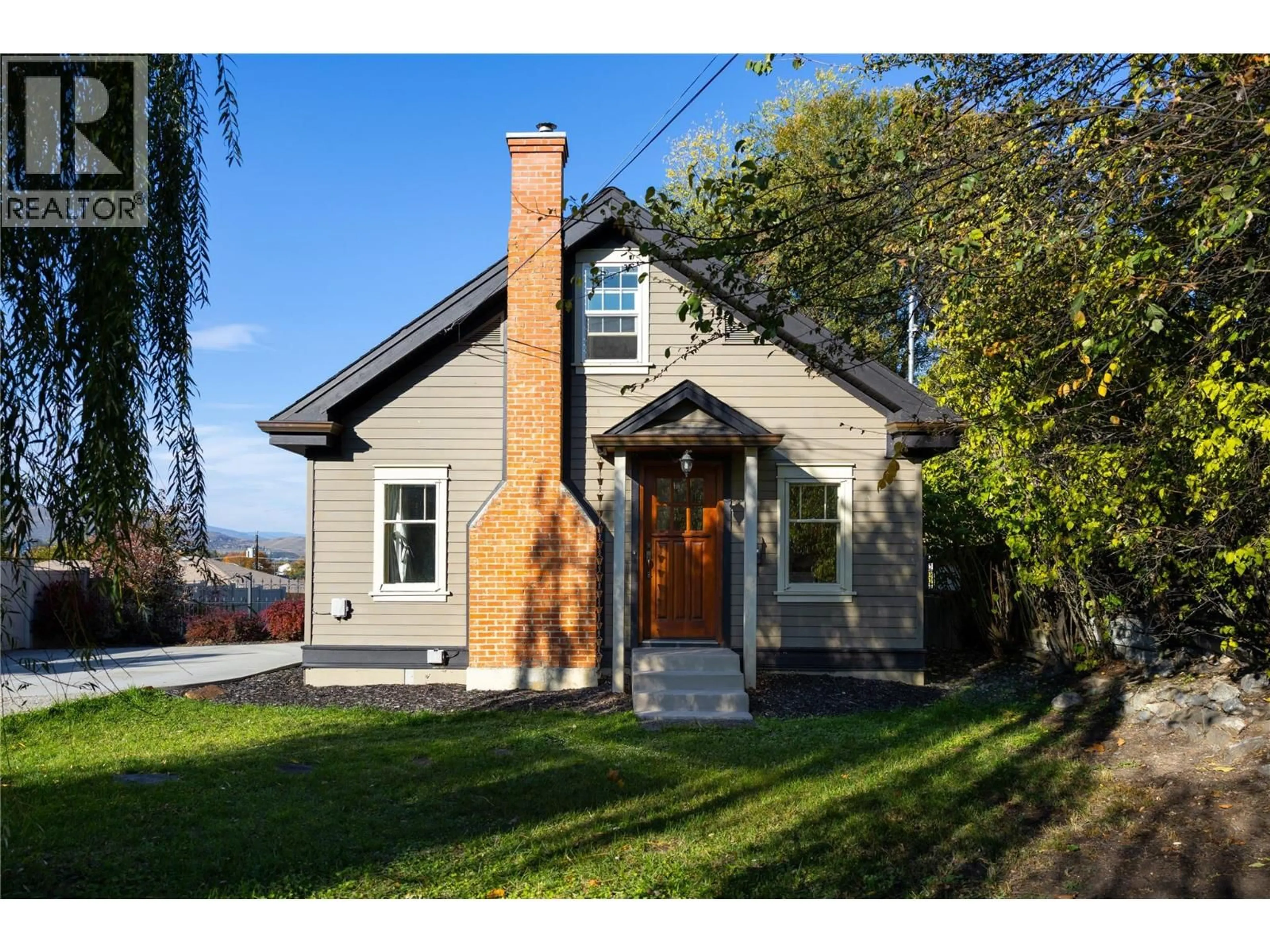 Home with brick exterior material, street for 4004 PLEASANT VALLEY ROAD, Vernon British Columbia V1T4M2