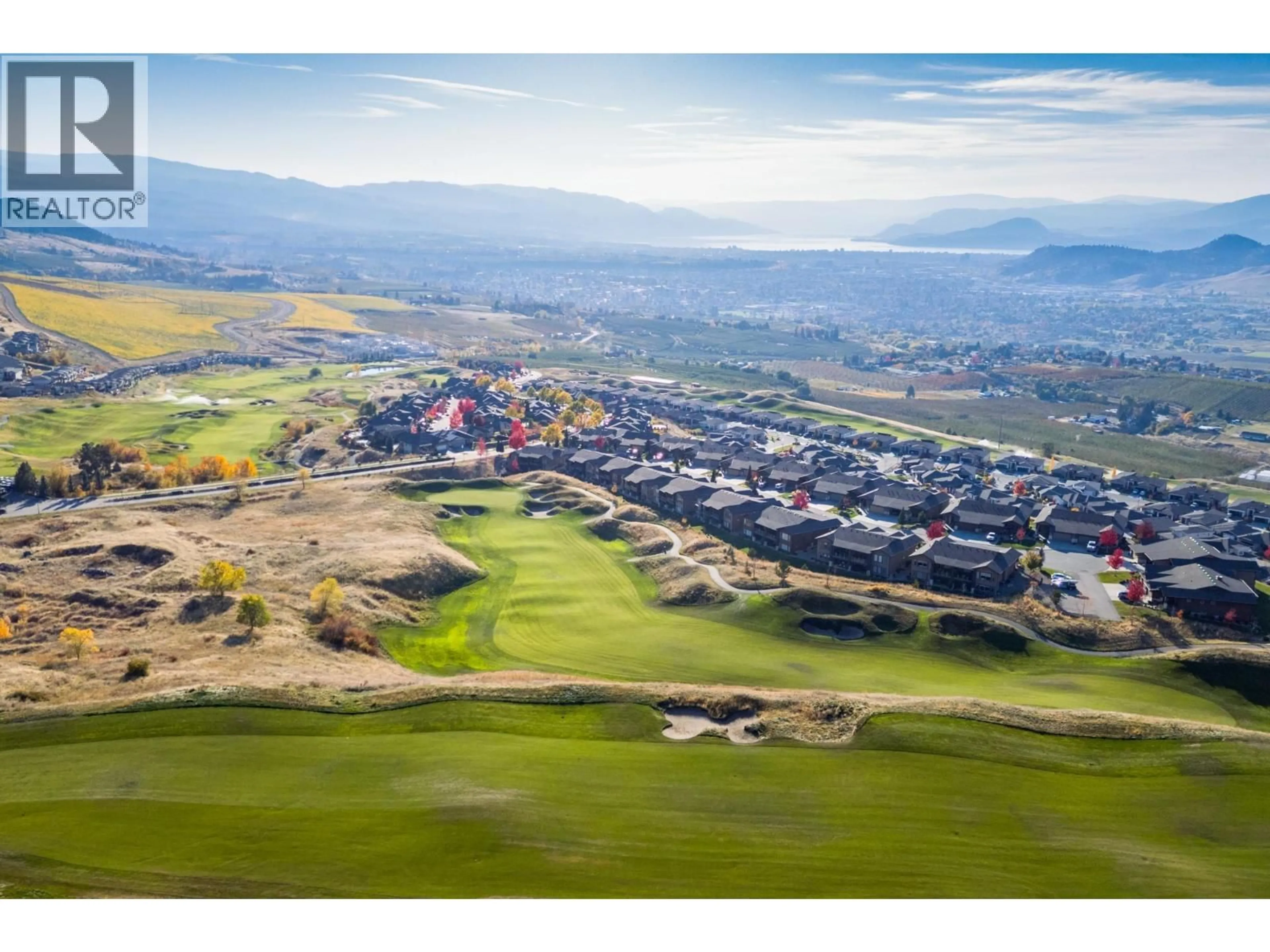 A pic from outside/outdoor area/front of a property/back of a property/a pic from drone, mountain view for 36 - 1836 TOWER RANCH BOULEVARD, Kelowna British Columbia V1P1S8