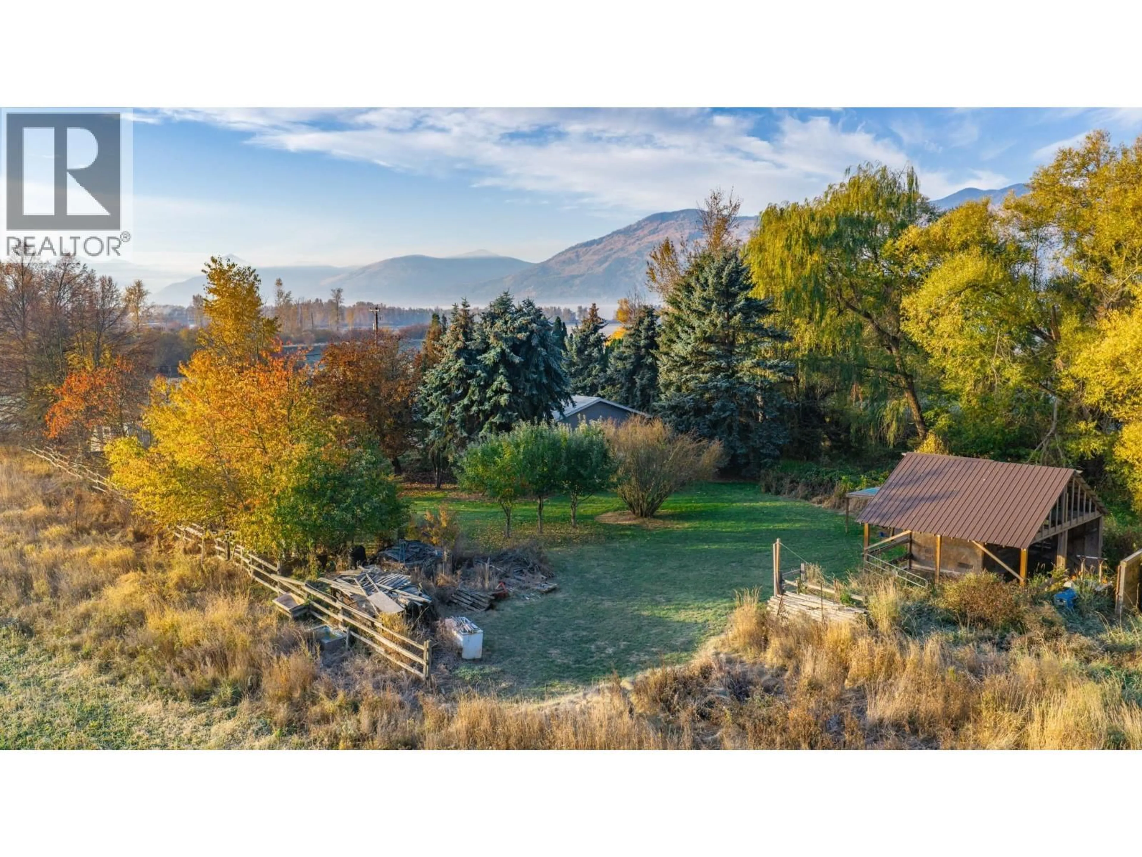 A pic from outside/outdoor area/front of a property/back of a property/a pic from drone, mountain view for 306 KOOTENAY RIVER ROAD, Creston British Columbia V0B1C1