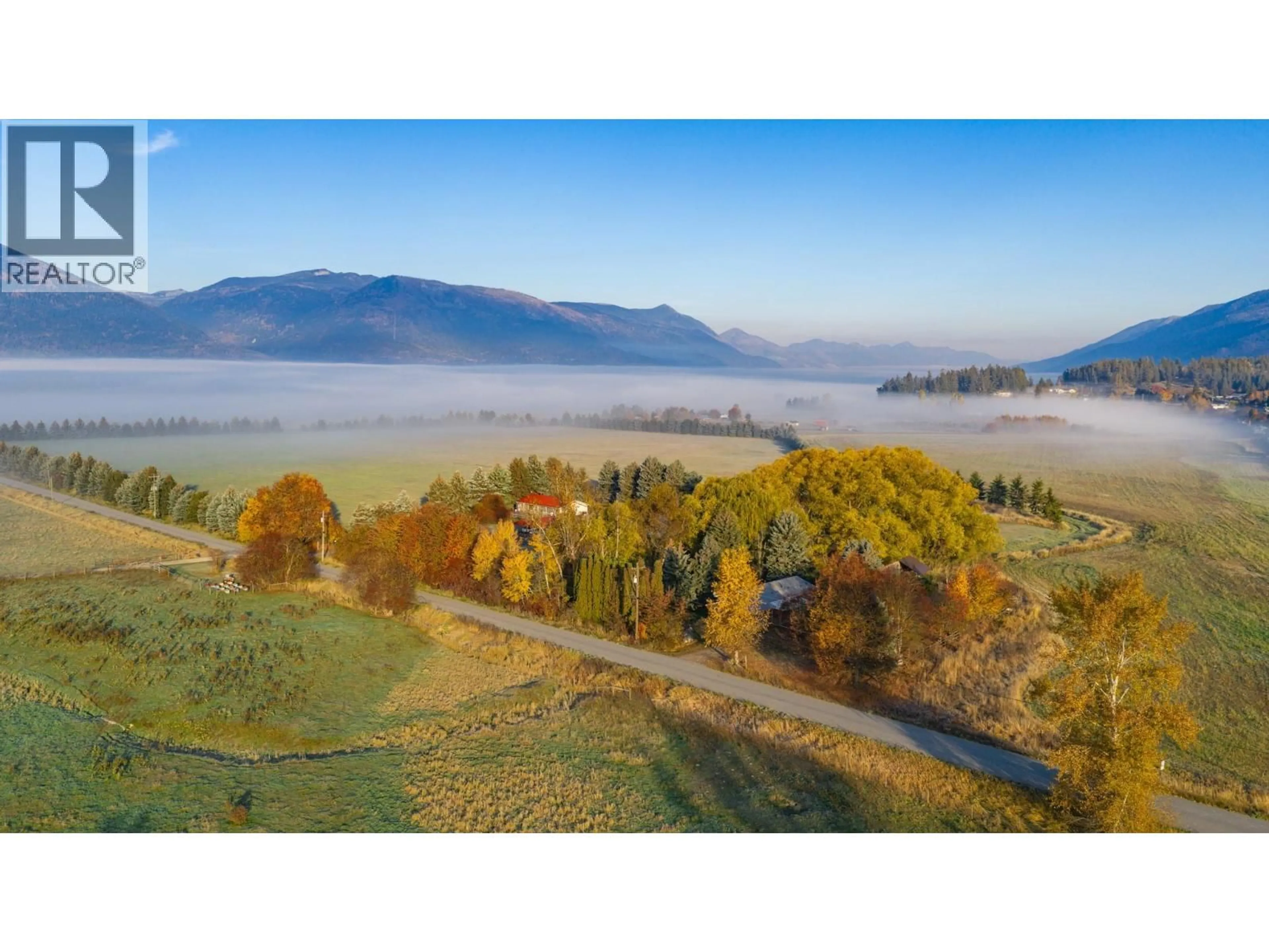 A pic from outside/outdoor area/front of a property/back of a property/a pic from drone, mountain view for 306 KOOTENAY RIVER ROAD, Creston British Columbia V0B1C1