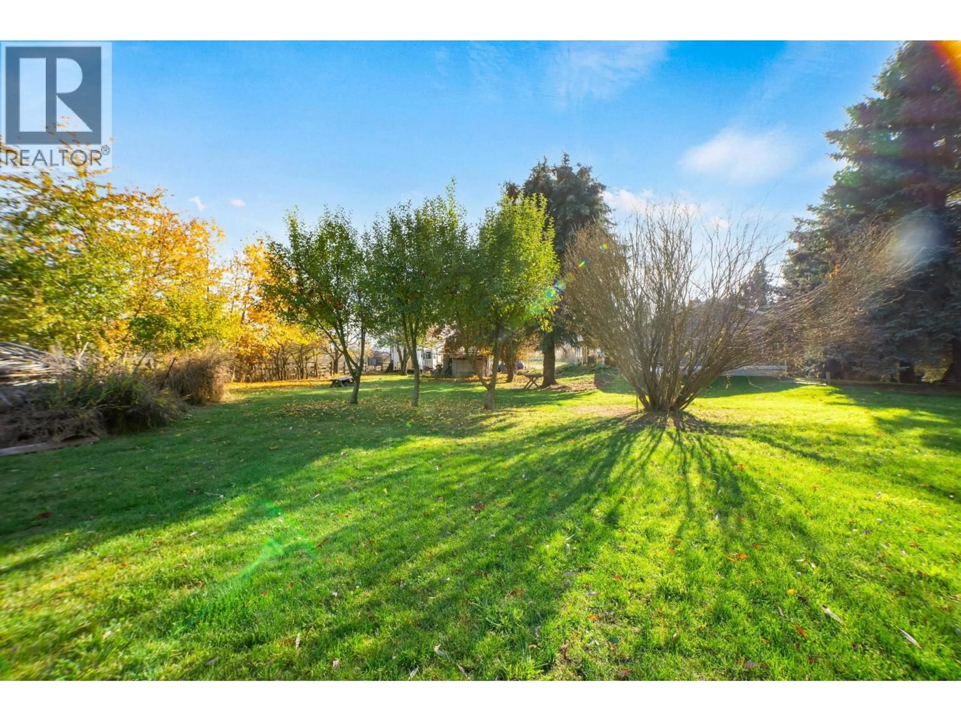 A pic from outside/outdoor area/front of a property/back of a property/a pic from drone, forest/trees view for 306 KOOTENAY RIVER ROAD, Creston British Columbia V0B1C1