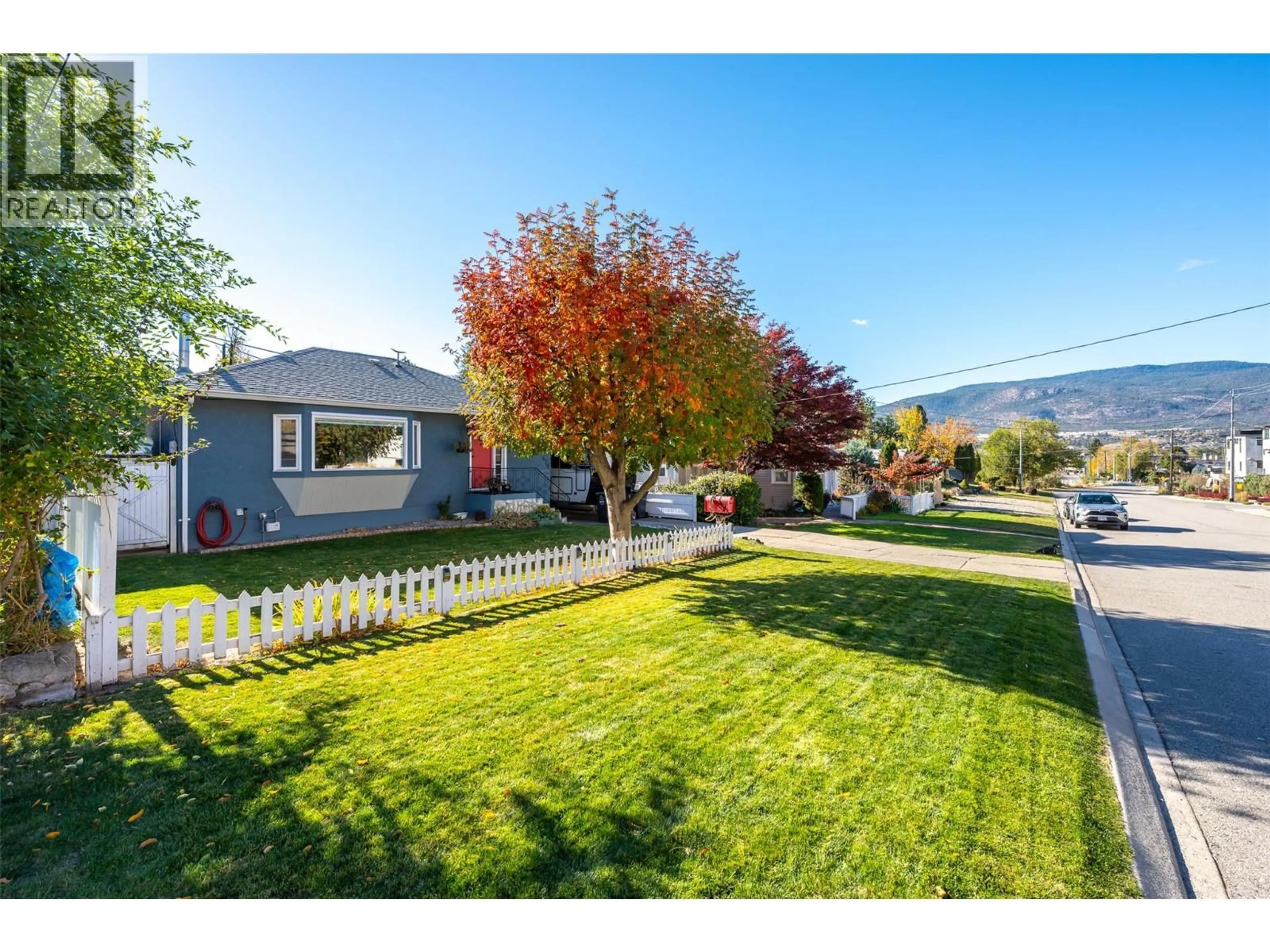 A pic from outside/outdoor area/front of a property/back of a property/a pic from drone, street for 570 WADE AVENUE EAST, Penticton British Columbia V2A1T3