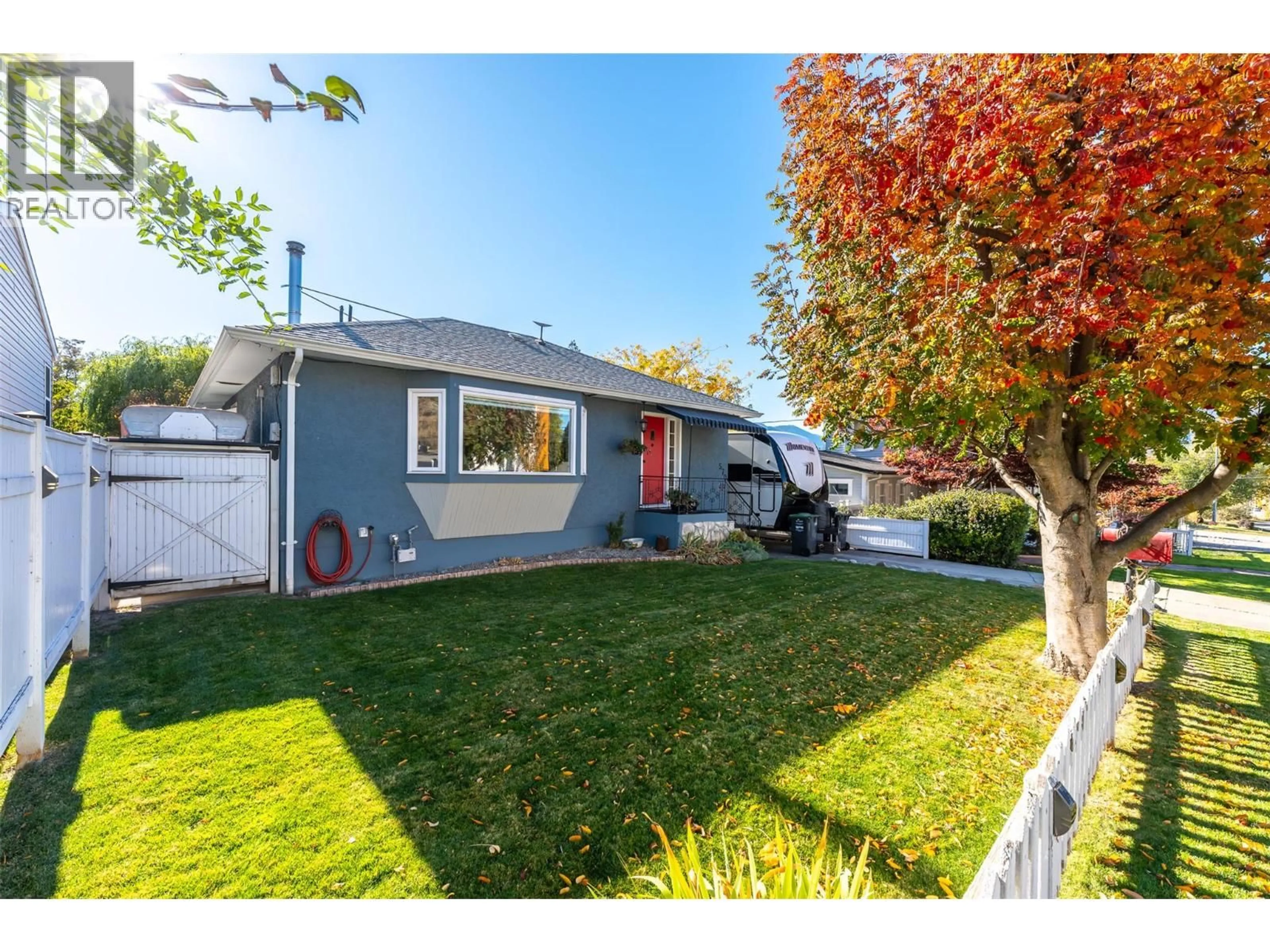 Home with vinyl exterior material, street for 570 WADE AVENUE EAST, Penticton British Columbia V2A1T3