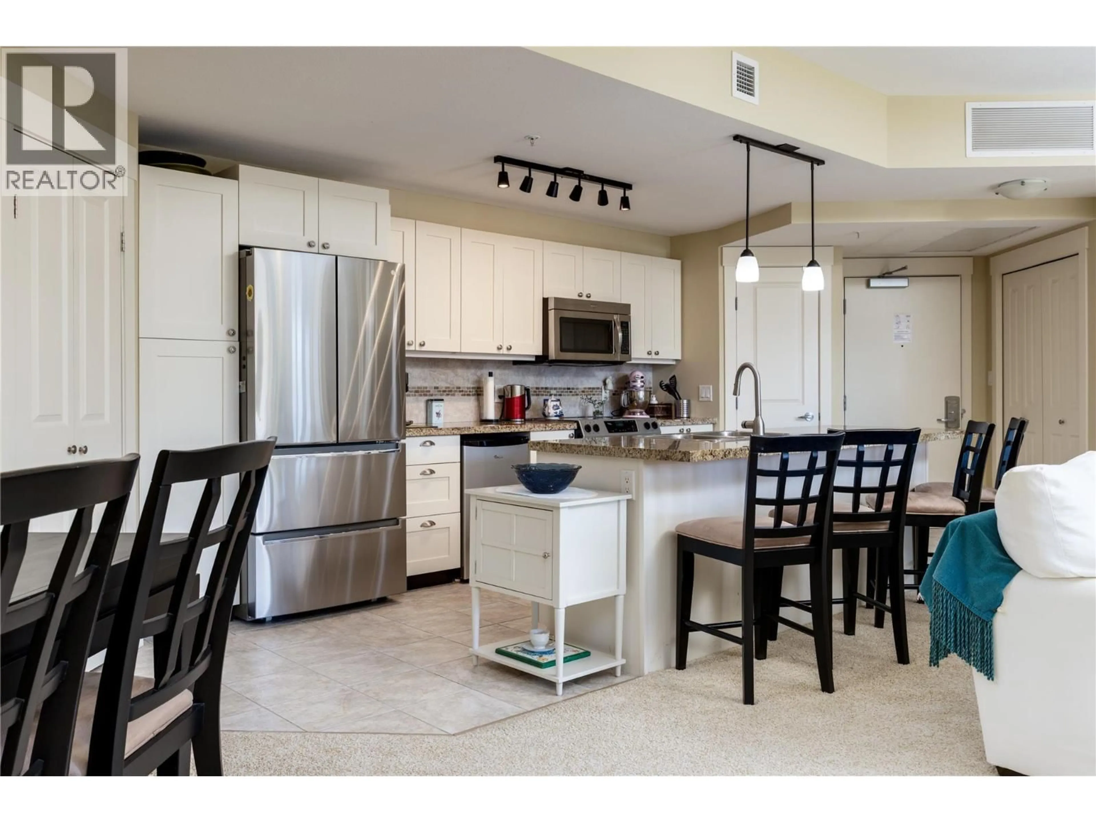 Open concept kitchen, ceramic/tile floor for 231 - 4205 GELLATLY ROAD, West Kelowna British Columbia V4T2K2